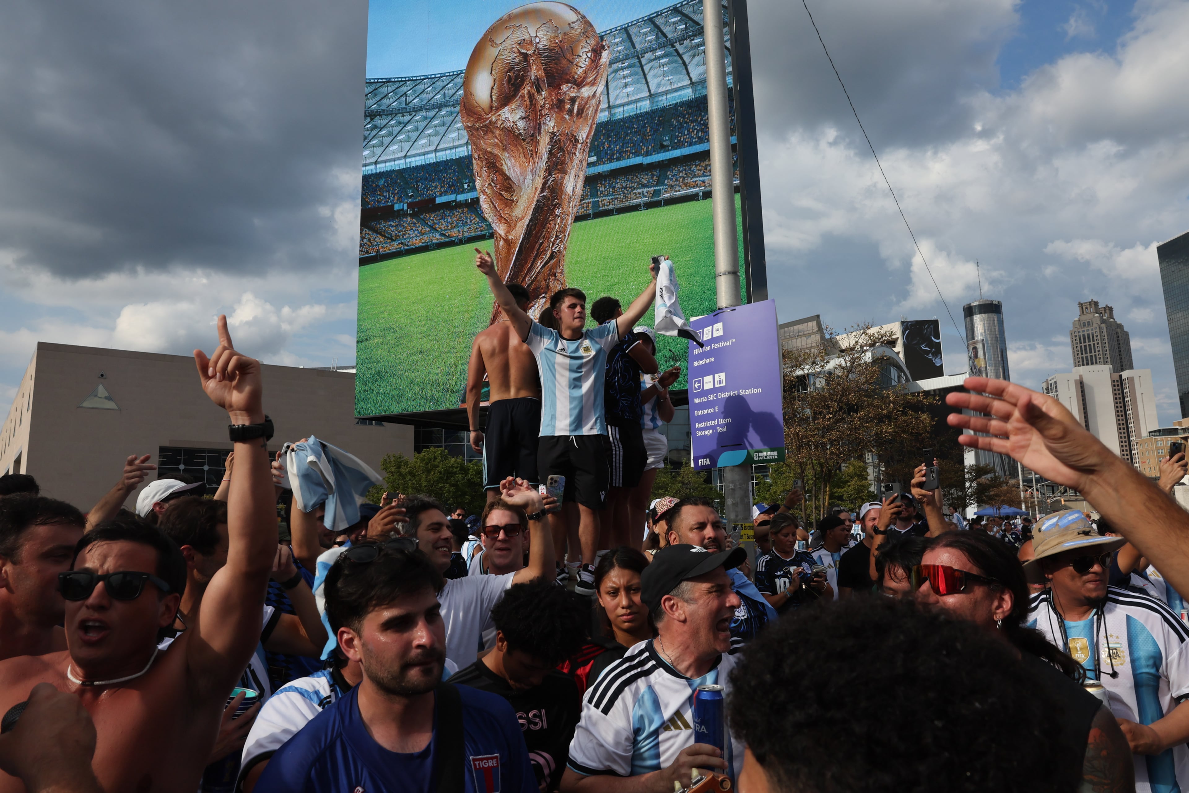 Argentina fans celebrate outside Atlanta Stadium (Mercedes-Benz Stadium) after Argentina wins the FIFA World Cup game between England and Argentina in Atlanta on July 15, 2026. It’s the last game Atlanta is hosting. Argentina won 2-1. (Arvin Temkar/AJC)