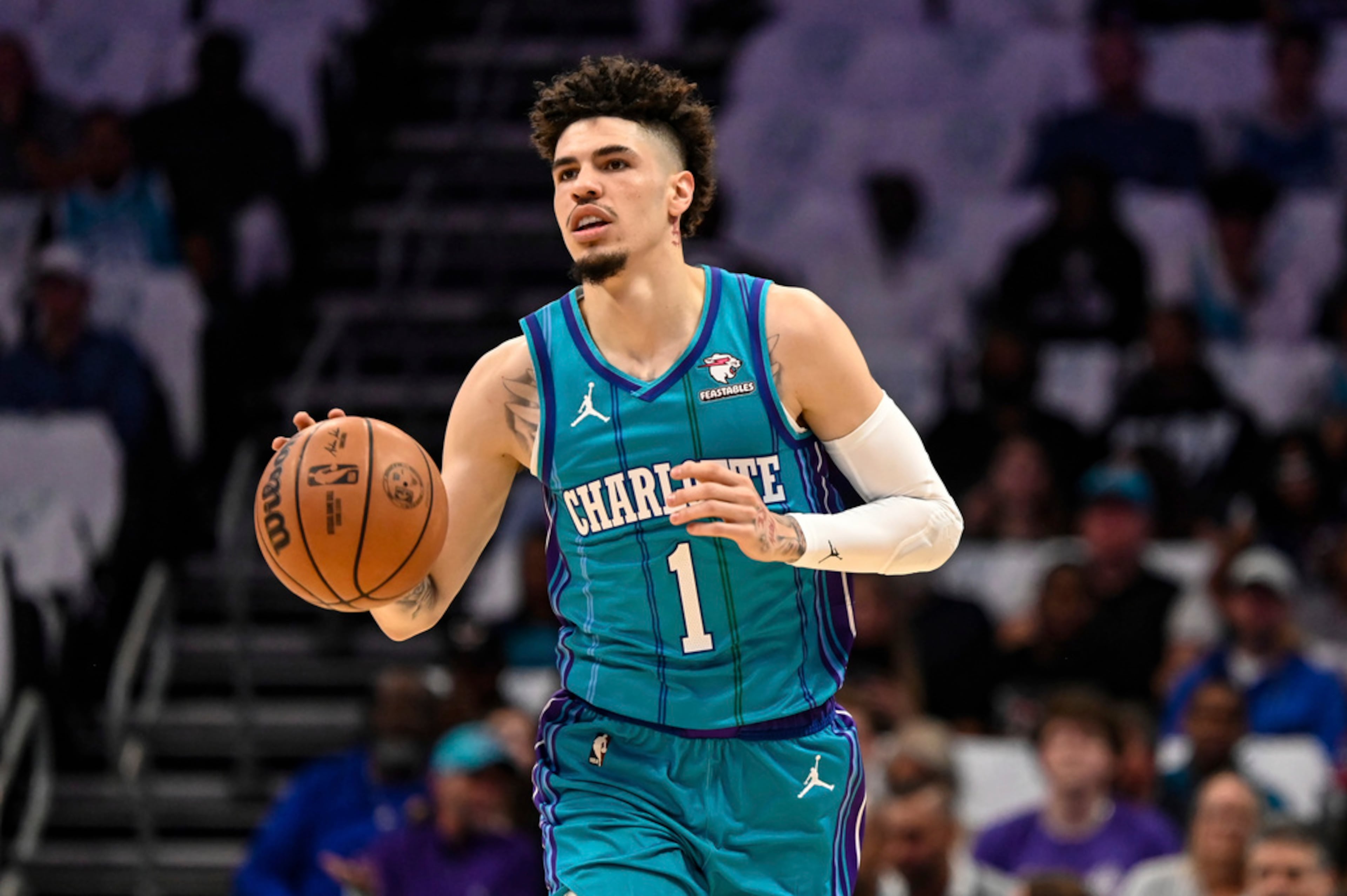 Charlotte Hornets guard LaMelo Ball brings the ball up during the first half of the team's NBA basketball game against the Atlanta Hawks, Wednesday, Oct. 25, 2023, in Charlotte, N.C. (AP Photo/Matt Kelley)
