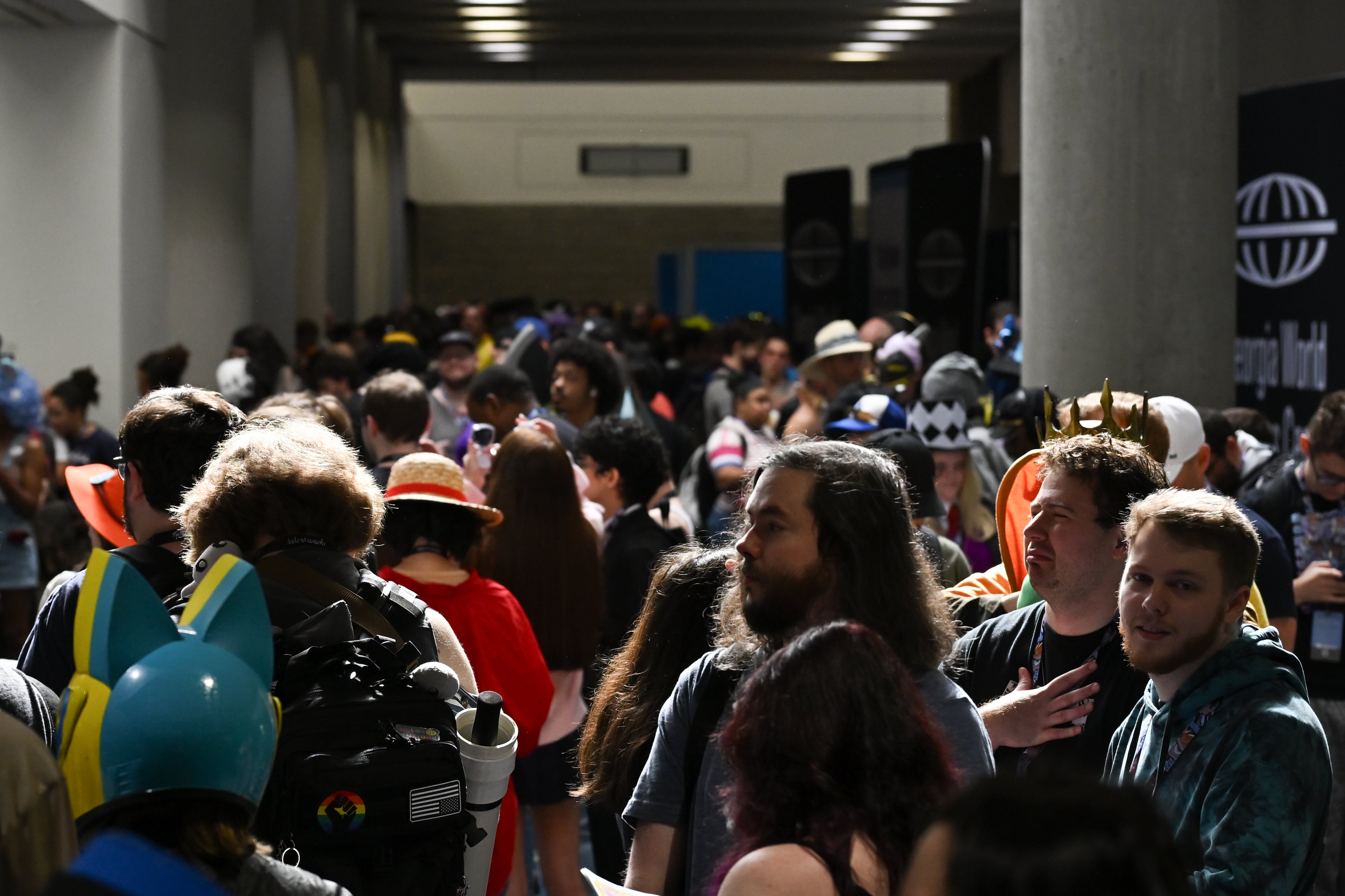 Attendees wait to enter MomoCon at the Georgia World Congress Center in Atlanta on Friday, May 22, 2026. (Tyler Sun for the AJC)