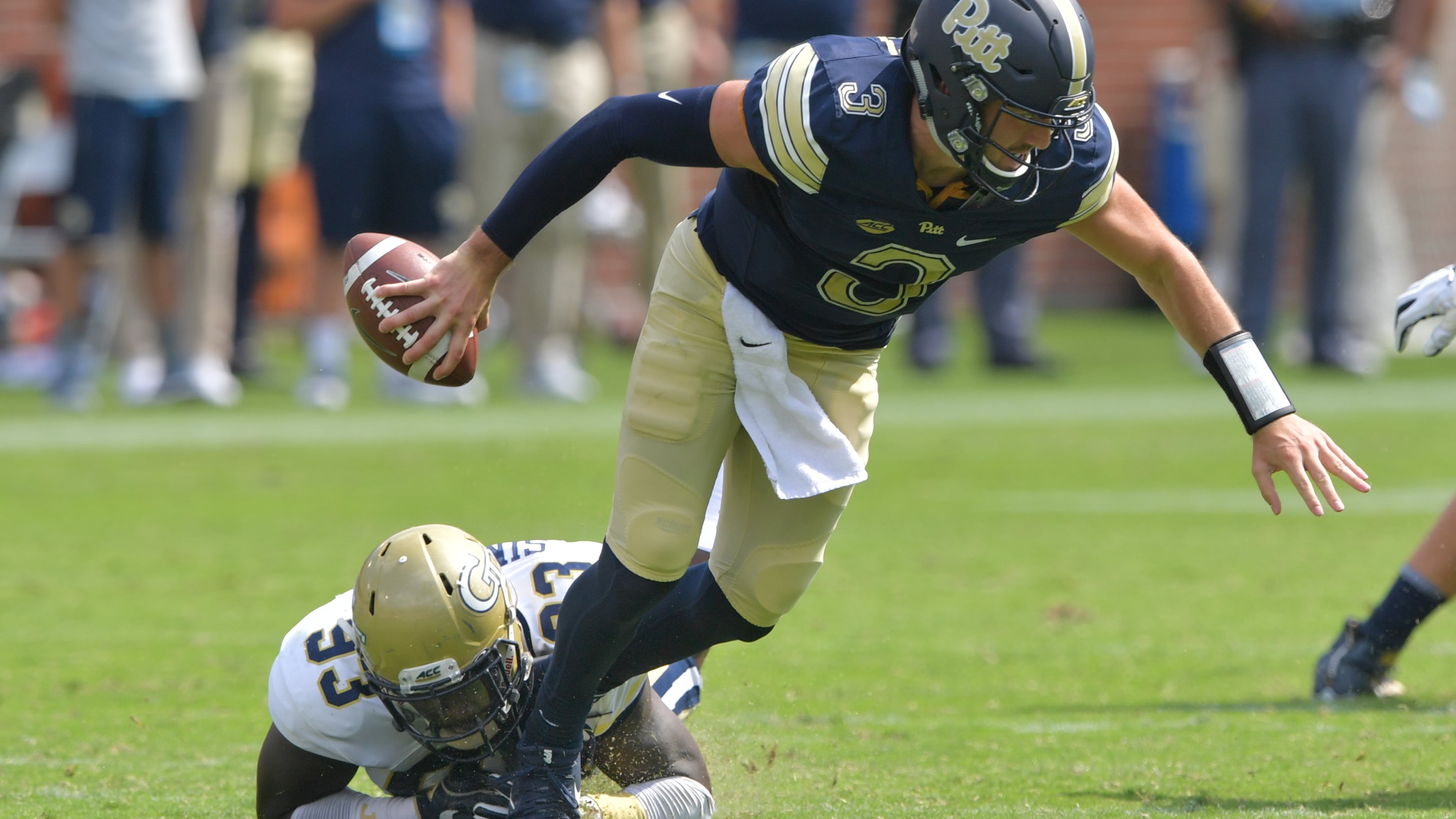 September 23, 2017 Atlanta - Pittsburgh quarterback Ben Dinucci (3) gets tackled from behind by Georgia Tech defensive lineman Antonio Simmons (93) in the second half of an NCAA college football game at Bobby Dodd Stadium on Saturday, September 23, 2017. Georgia Tech won 35 - 17 over the Pittsburgh. HYOSUB SHIN / HSHIN@AJC.COM