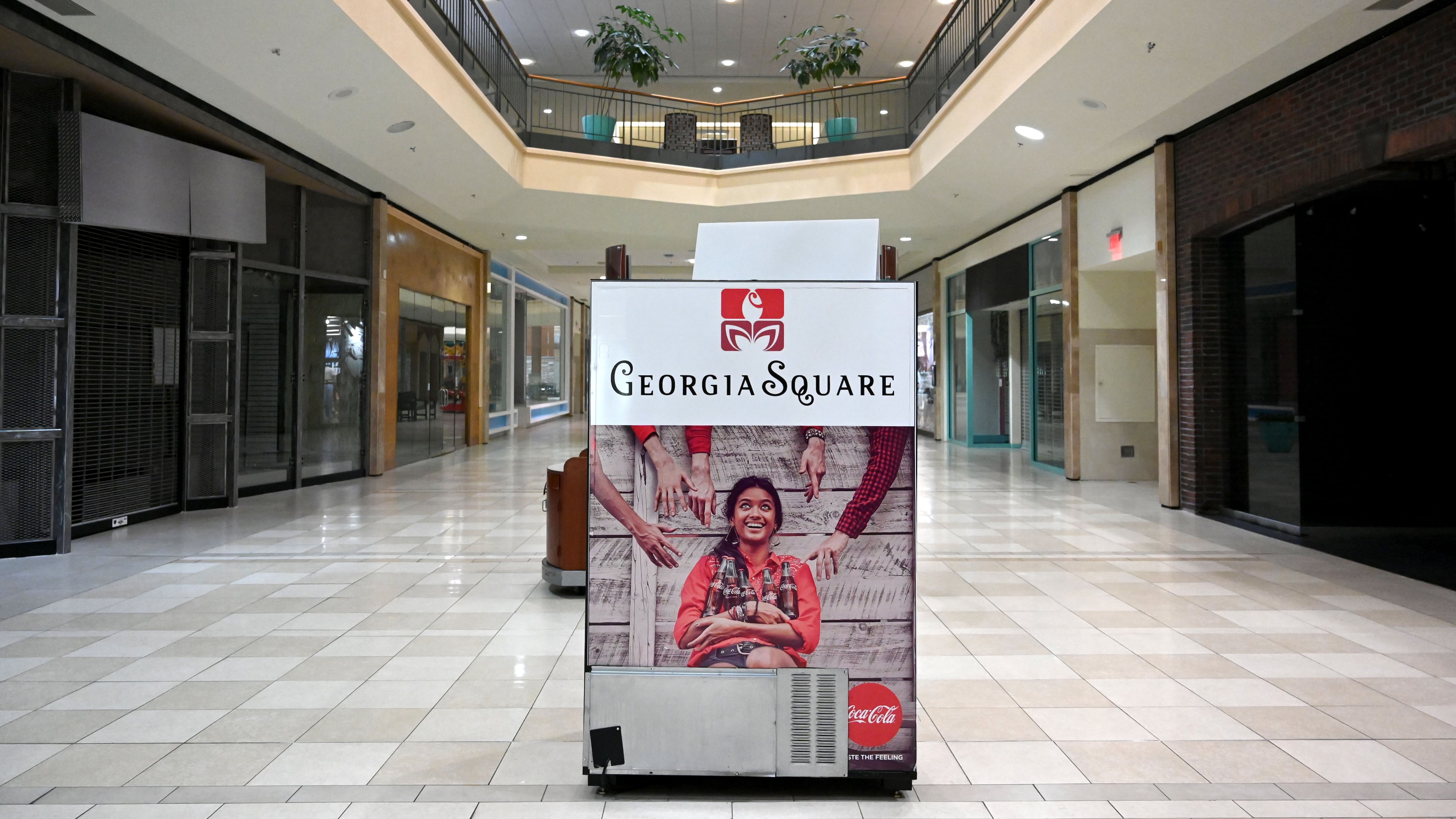 A "Georgia Square" sign sits in the middle of a nearly empty Georgia Square Mall in Athens in May 2025. (Hyosub Shin/AJC)