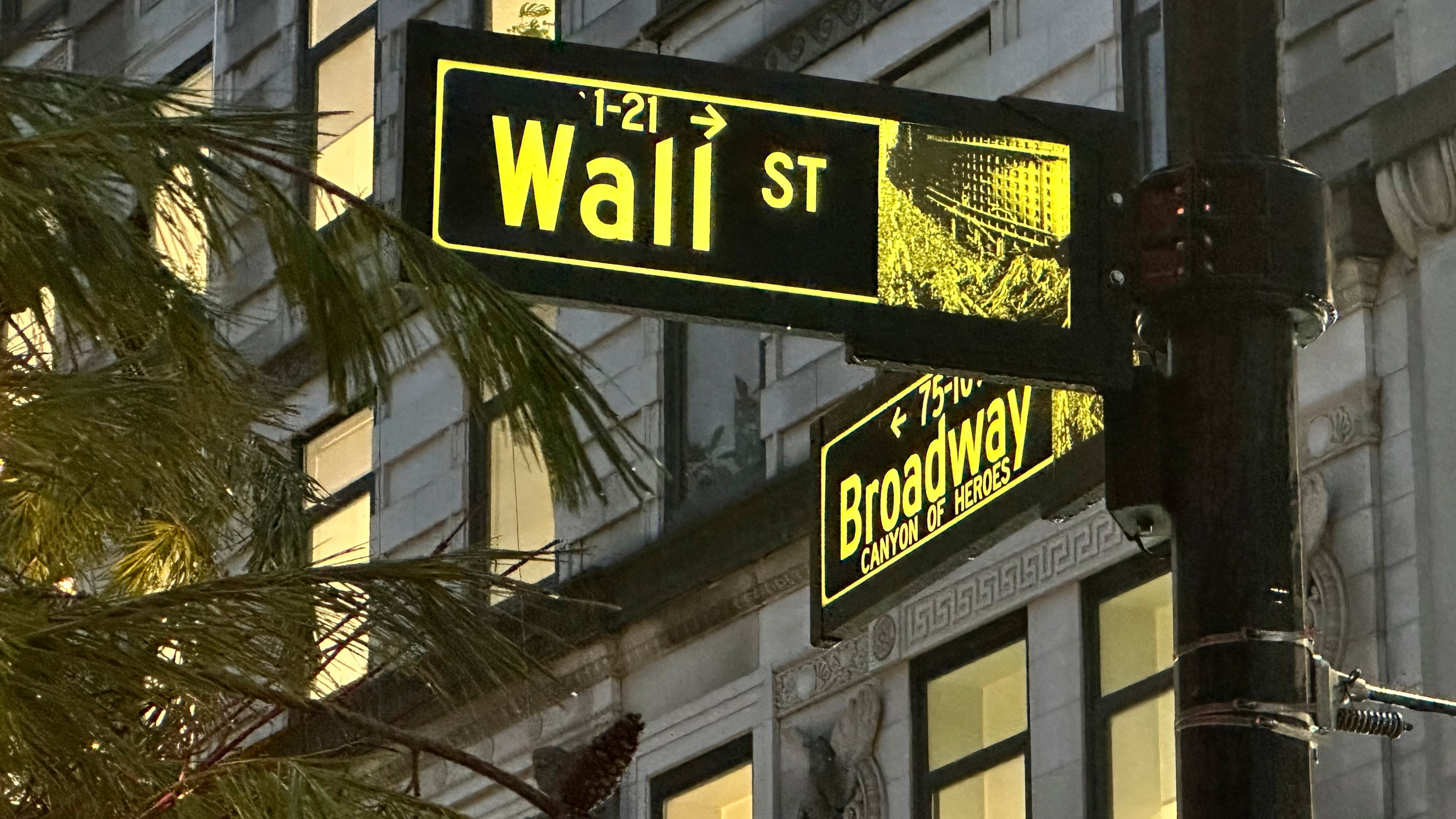 FILE - Signs mark the intersection of Wall Street and Broadway in New York's Financial District on Wednesday Dec.11, 2024. (AP Photo/Peter Morgan, File)