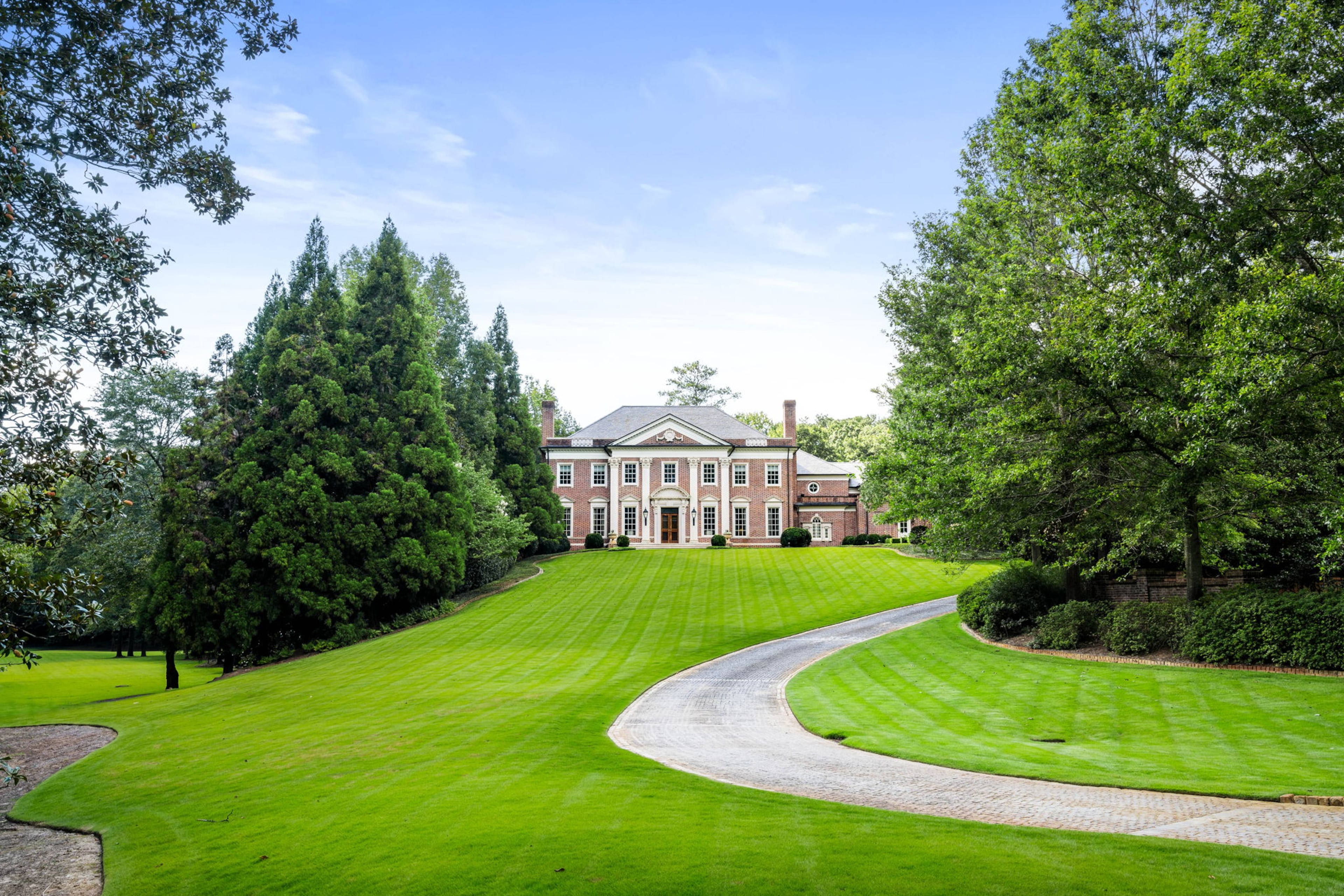 Sold for $12,865,000, the Buckhead property features over 14,000 square feet of living space in the main house alone.
