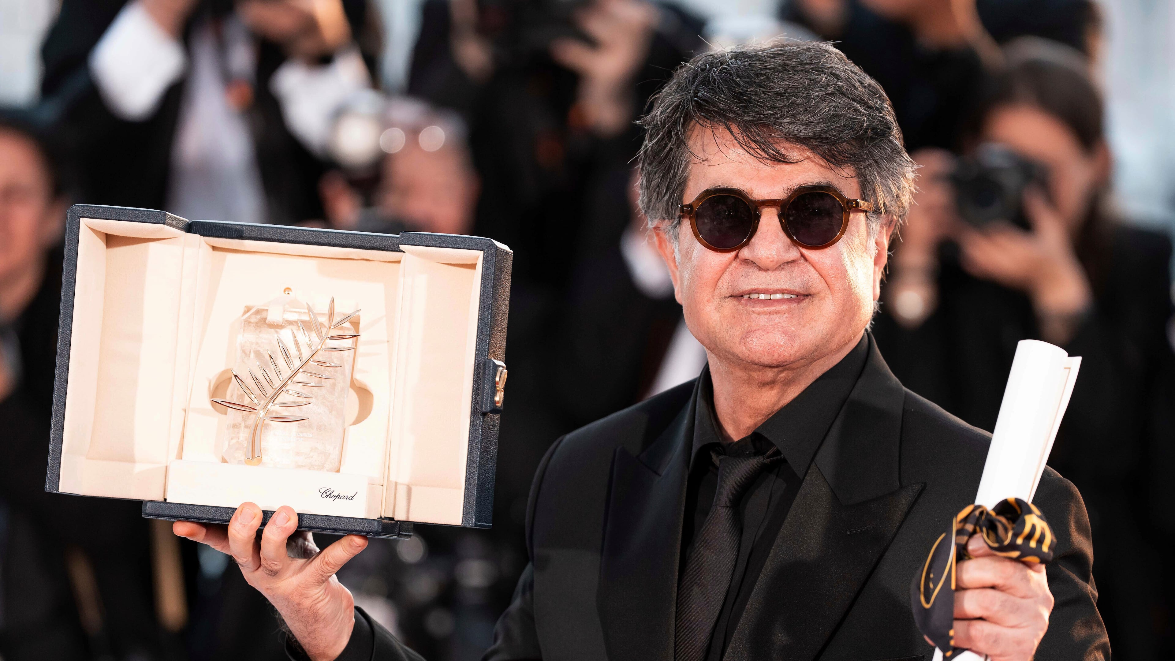 FILE - Director Jafar Panahi, winner of the Palme d'Or for the film "It Was Just an Accident," appears at the awards ceremony photo call at the 78th international film festival, Cannes, southern France, on May 24, 2025. (Photo by Scott A Garfitt/Invision/AP, File)