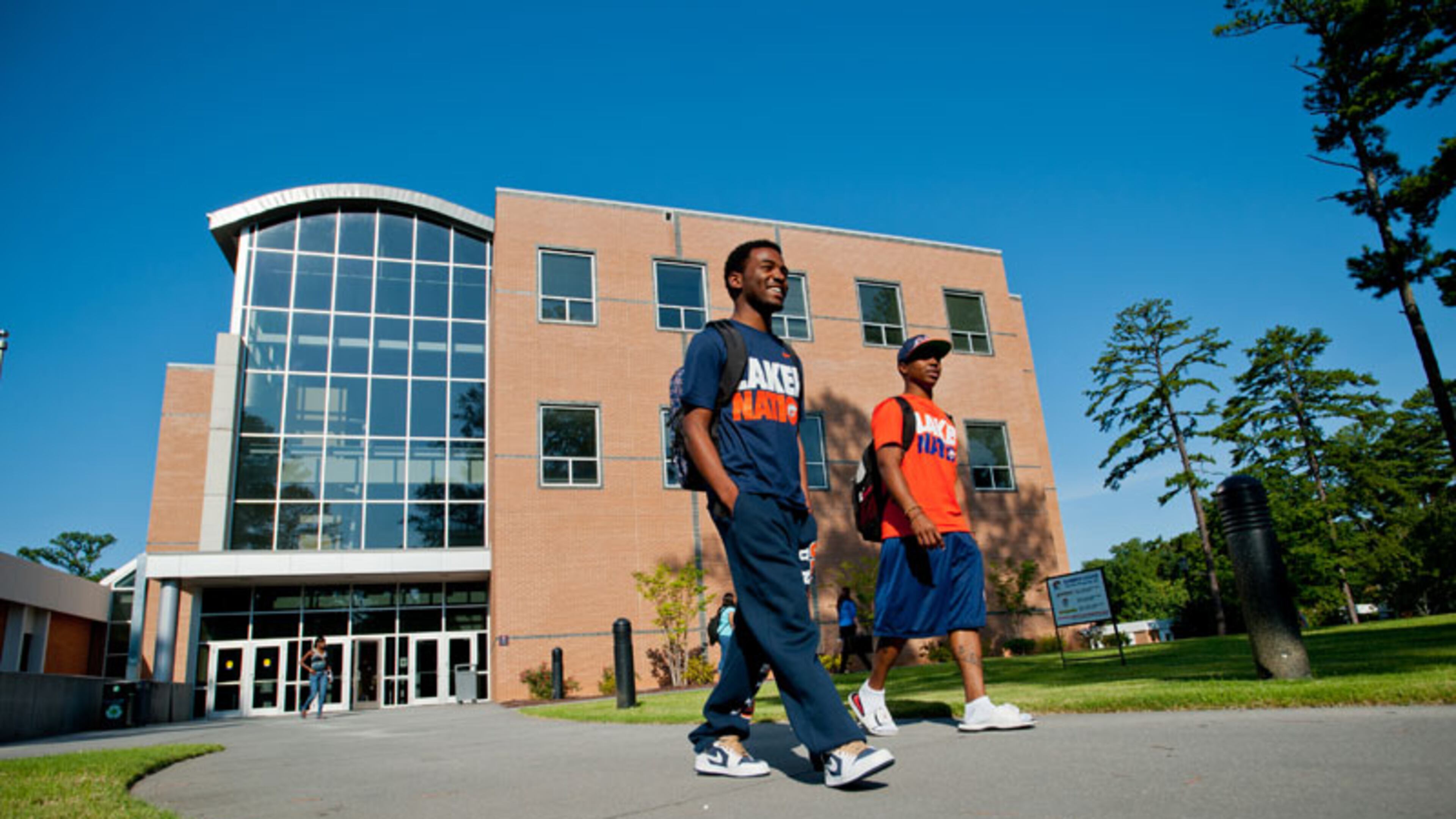 Students at Clayton State University walk across campus. One survey has ranked the university's online program as one of the best.