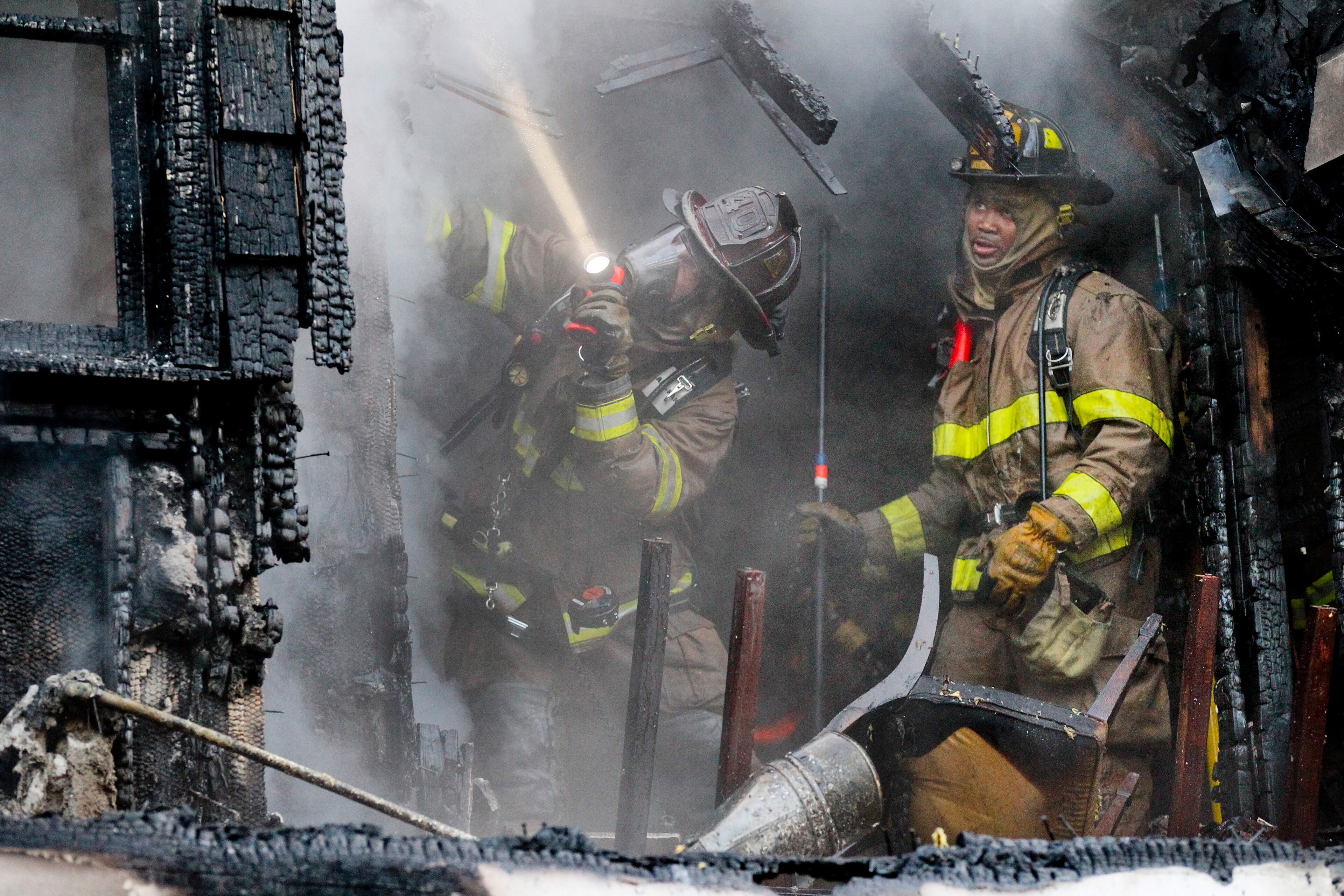 Firefighters were in every part of the house going after the fire. Atlanta firefighters battled a blaze early Friday, Mar. 8, 2013 at a home in a Buckhead neighborhood.