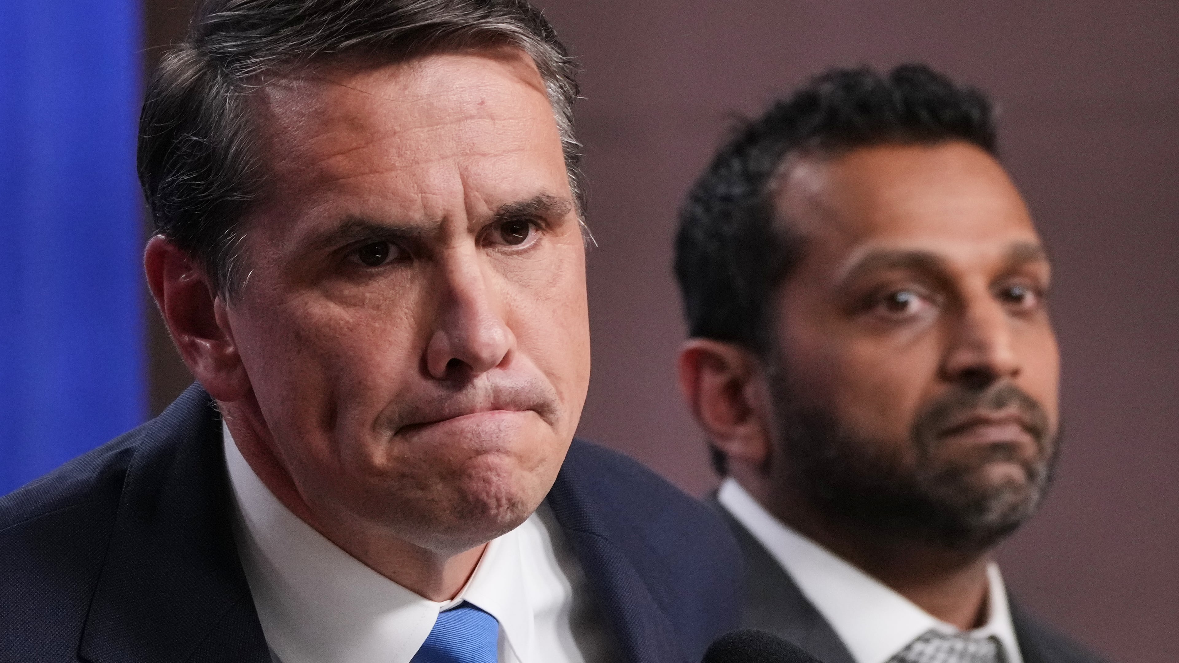 Acting Attorney General Todd Blanche speaks as FBI Director Kash Patel listens during a news conference at the Justice Department, Tuesday, April 21, 2026, in Washington. (AP Photo/Jacquelyn Martin)