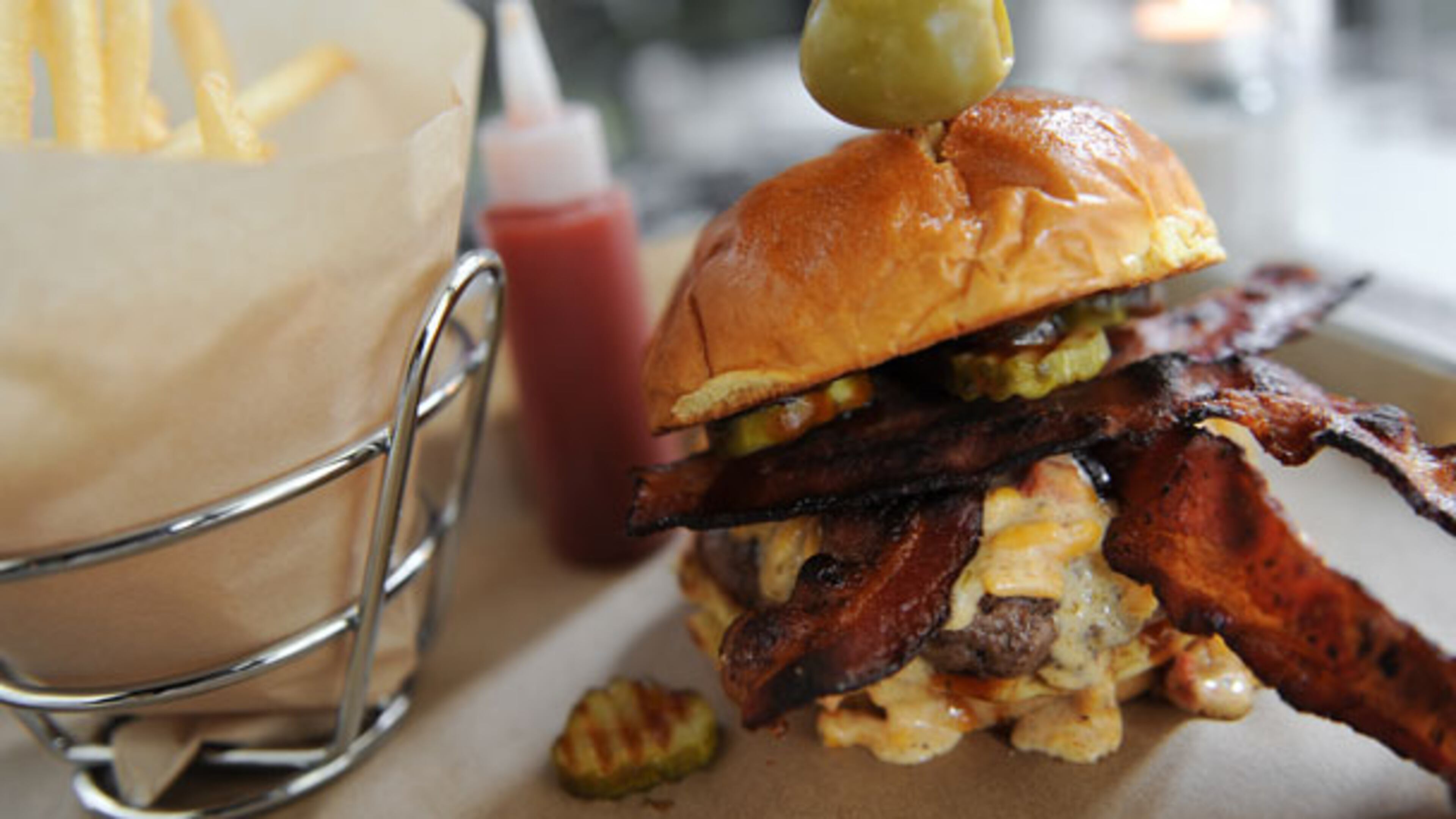 The “West Coast Meets East Coast BBQ Burger” is a featured item on the Big Kahuna menu.