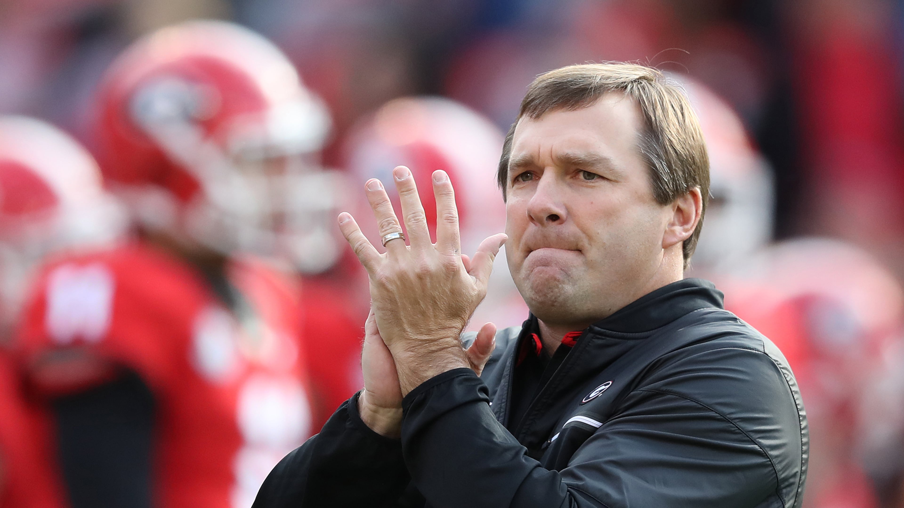 Georgia coach Kirby Smart cheers on his team as it prepares to play a game against Auburn last November. Smart went 8-5 in his first season at Georgia, including 4-4 in the SEC. (Curtis Compton/ccompton@ajc.com)