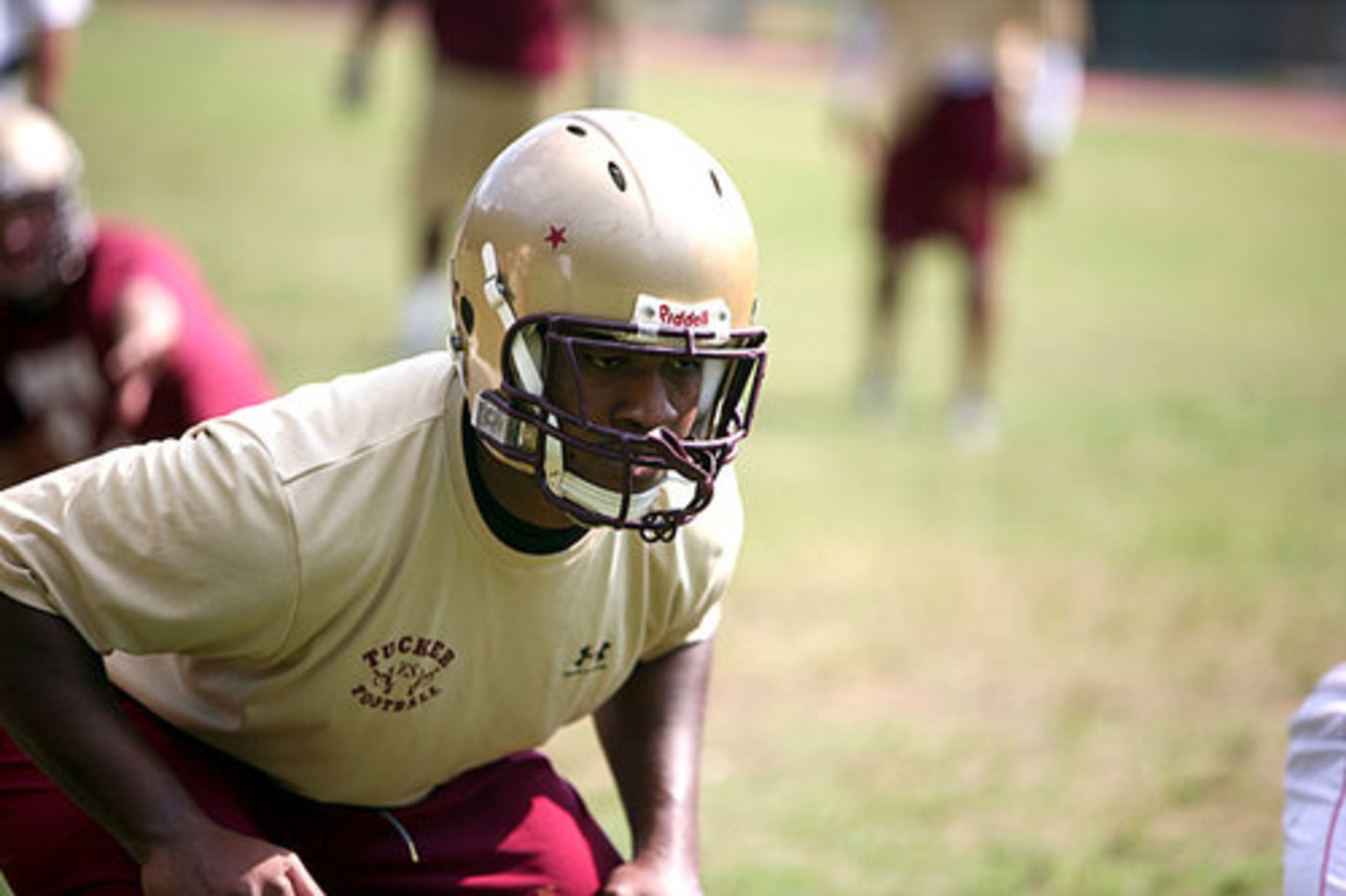 Deion Roberson gets ready for a play during practice. The highly-recruited DL says he will make official visits to the following five schools: Tennessee, Florida State, Michigan State, West Virginia and Maryland.