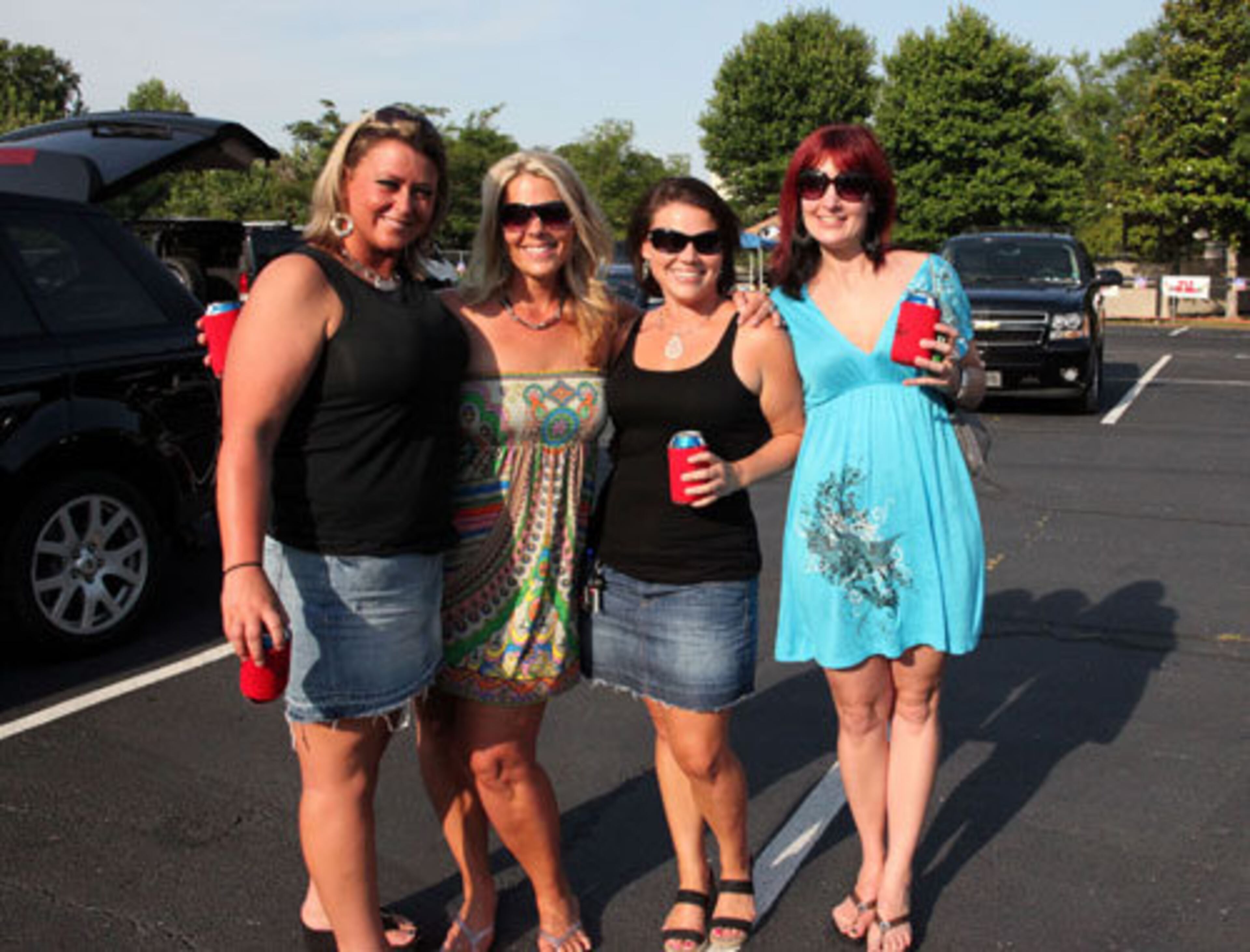 Ashley Gravitt, Kristen Mason, Christi Franklin and Stacy Cendrowski, of Cumming, are big fans of Kenny Chesney.