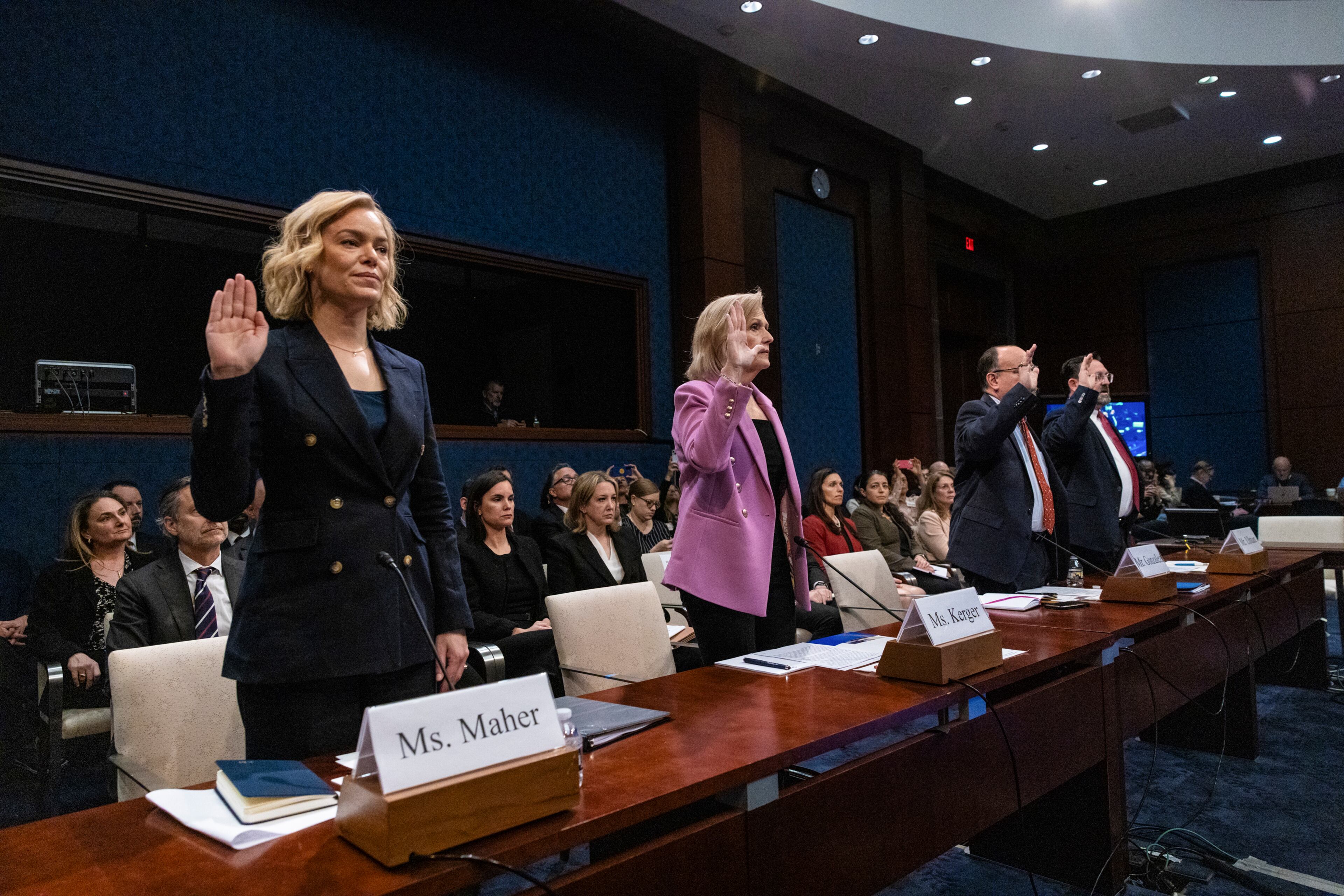 From left: Katherine Maher, chief executive and president of NPR; Paula Kerger, president and chief executive of PBS; Michael Gonzalez, a senior fellow at the Heritage Foundation; and Ed Ulman, president and chief executive of Alaska Public Media; are sworn in for a hearing before the House Committee on Oversight and Government Reform subcommittee on Delivering Government Efficiency on Capitol Hill in Washington, on Wednesday, March 26, 2025. (Anna Rose Layden/The New York Times)