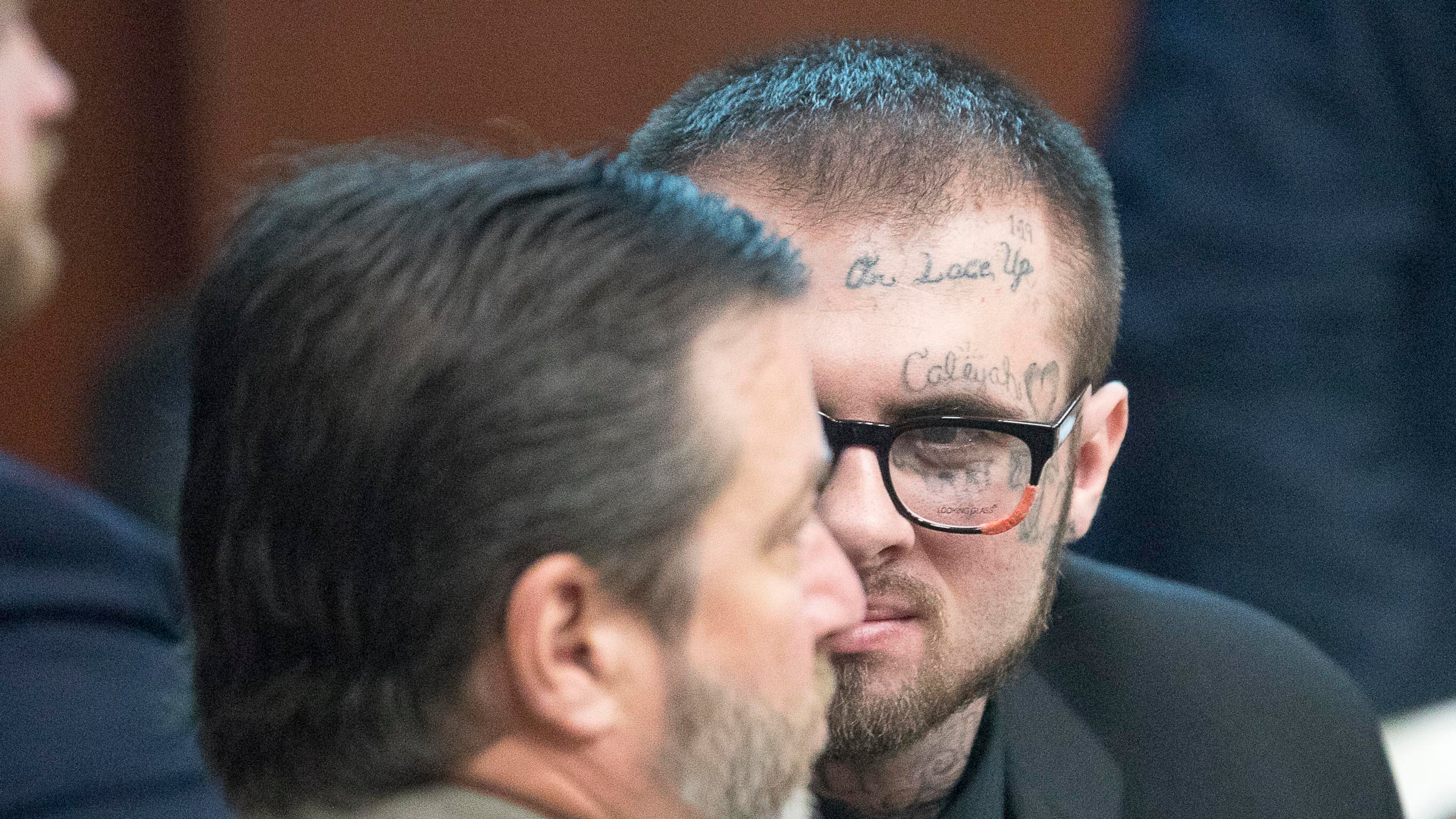 05/13/2019 -- Covington, Georgia -- Christopher McNabb (right) speaks with his lawyer Anthony Carter (left) during his and Cortney Bell's murder trial in front of Georgia Chief Superior Court Judge John M. Ott at the Newton County Courthouse in Covington, Monday, May 13, 2019. (ALYSSA POINTER/ALYSSA.POINTER@AJC.COM)