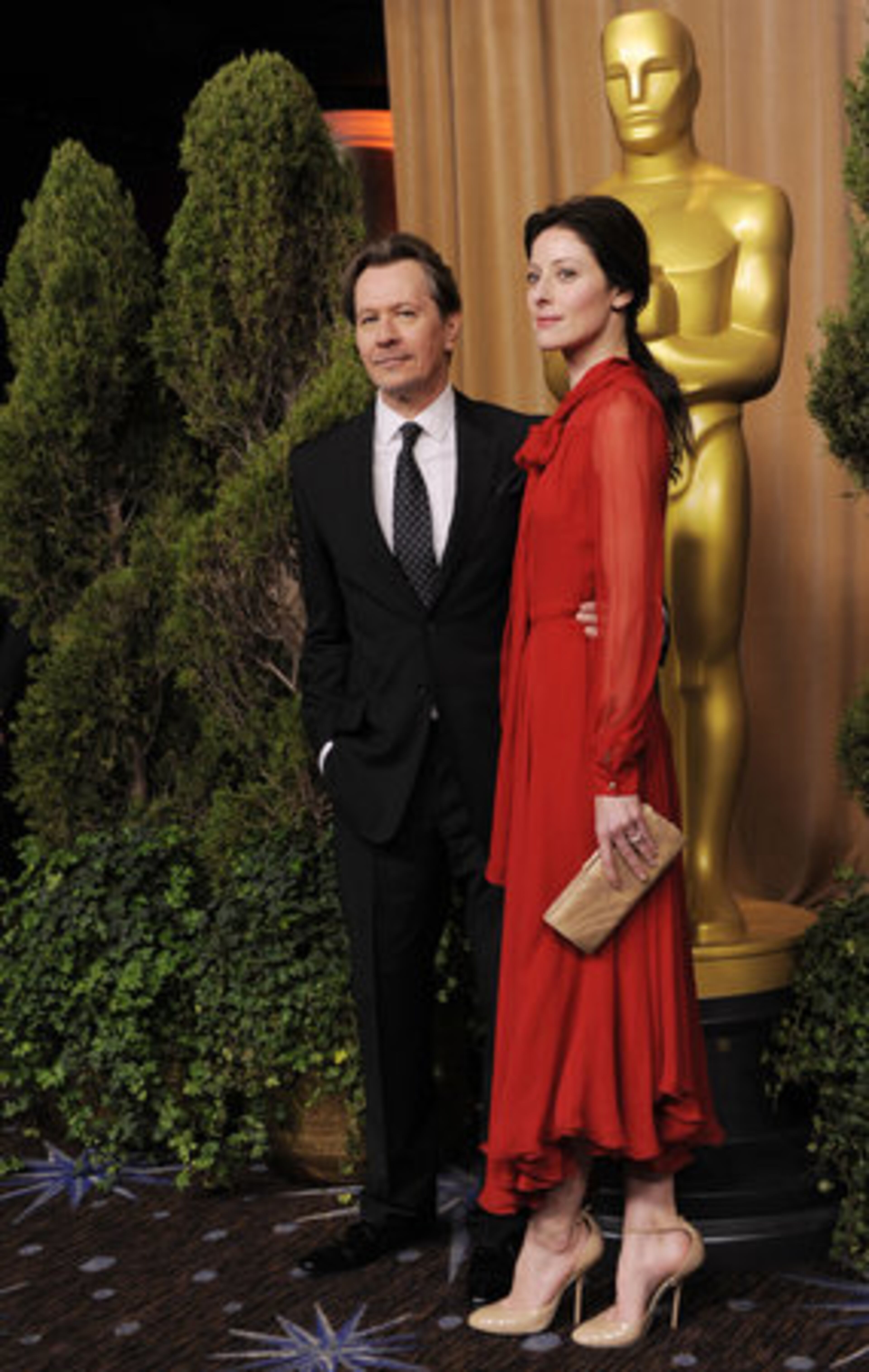 Gary Oldman, a Best Actor nominee for "Tinker, Tailor, Soldier, Spy," poses with his wife Alexandra Edenborough at Academy Awards Luncheon.