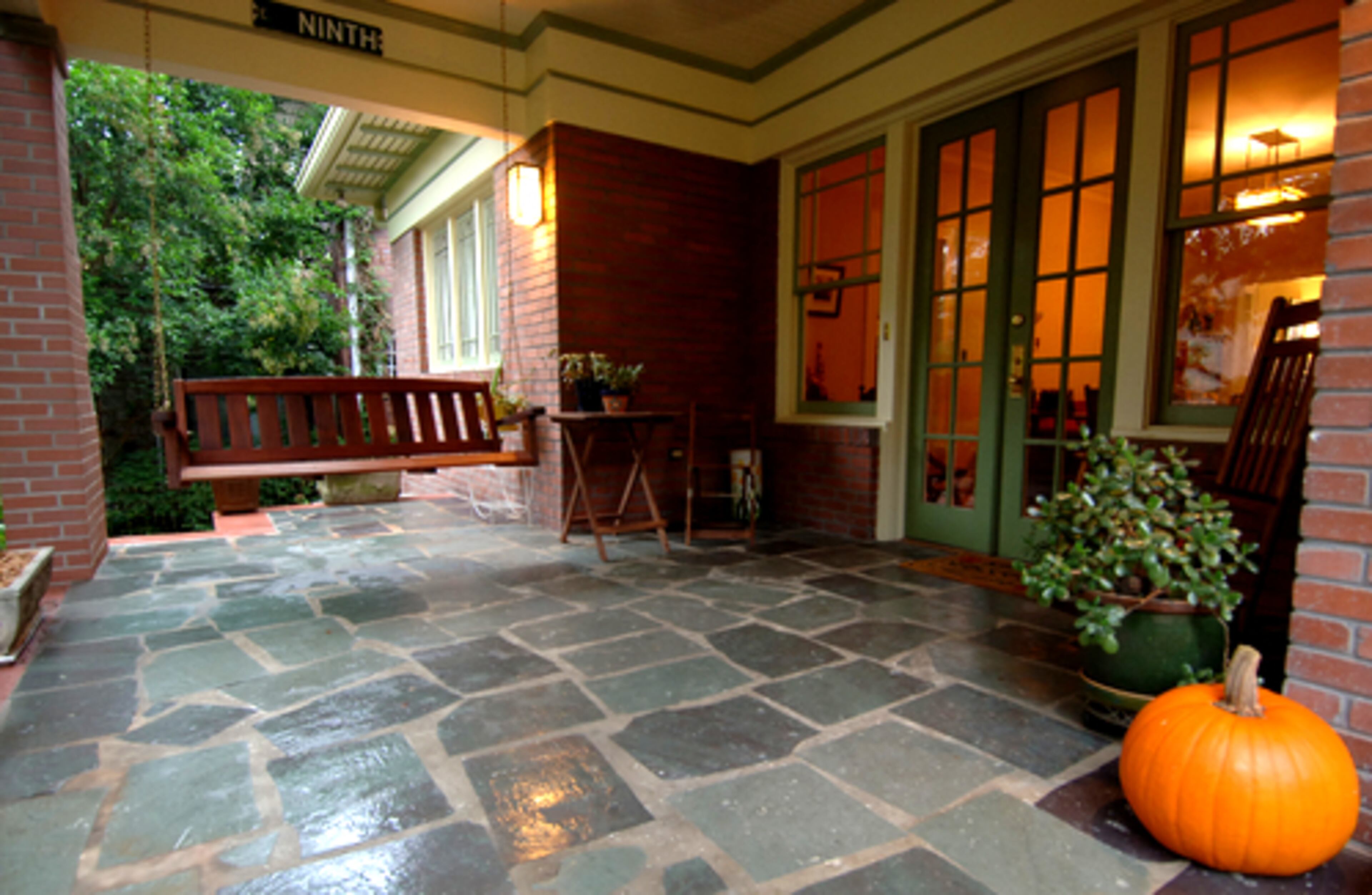 The most dramatic change was recreating the original front porch. The porch had been turned into a sunroom. Guided by photos of the house before its 1970s renovation, they were able to return the porch to its original use and look.