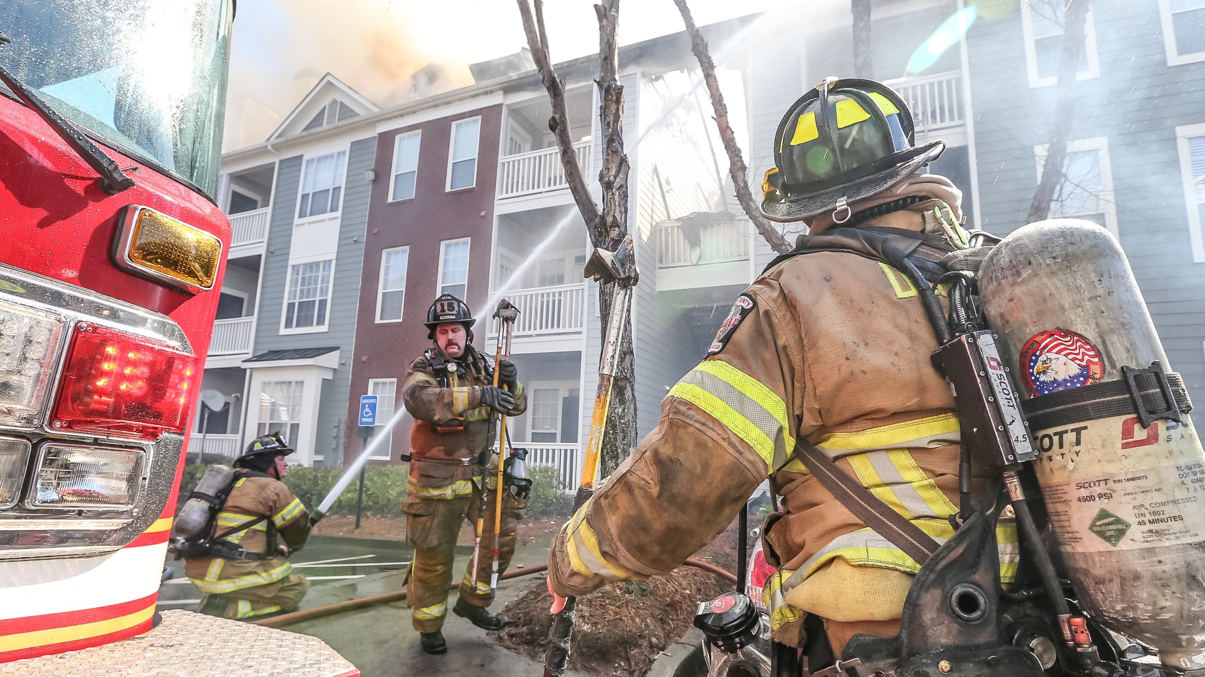 DeKalb County firefighters were on the scene of a massive blaze at The Marq at Brookhaven apartment complex on Fri., Feb. 19, 2016. JOHN SPINK / JSPINK@AJC.COM