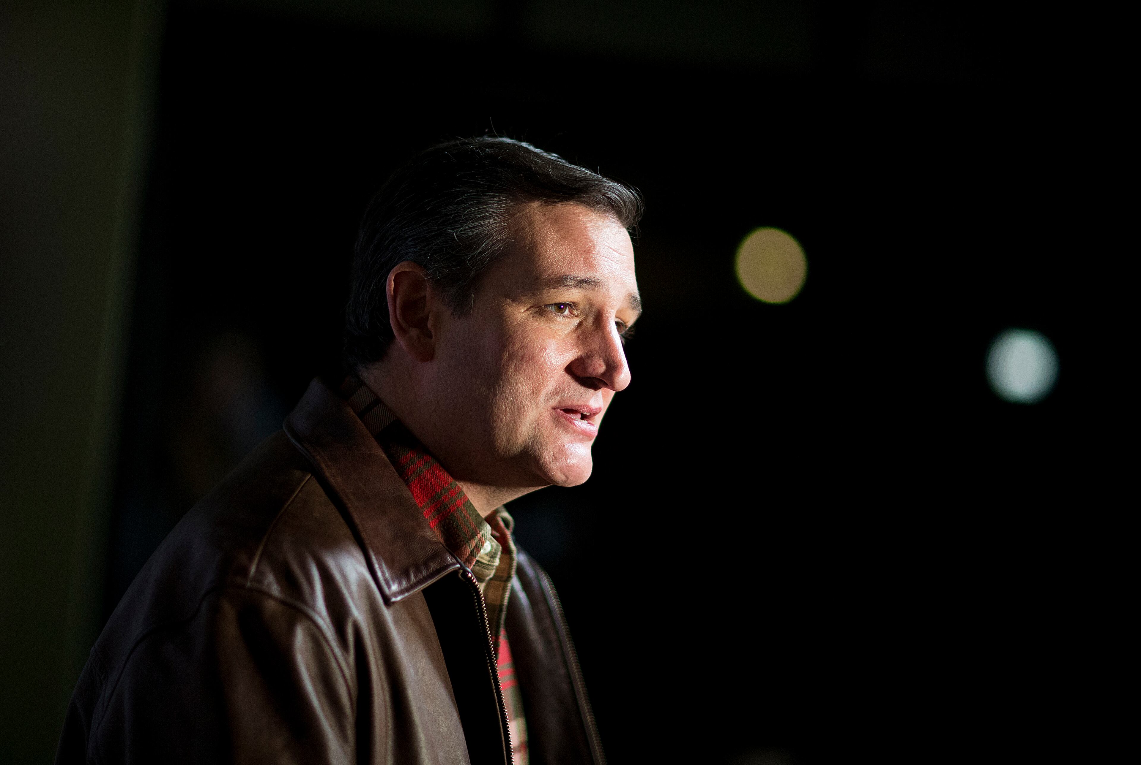 Republican presidential candidate Sen. Ted Cruz, R-Texas, speaks to the media before taking the stage for a campaign event Friday, Dec. 18, 2015, in Kennesaw, Ga. (AP Photo/David Goldman)