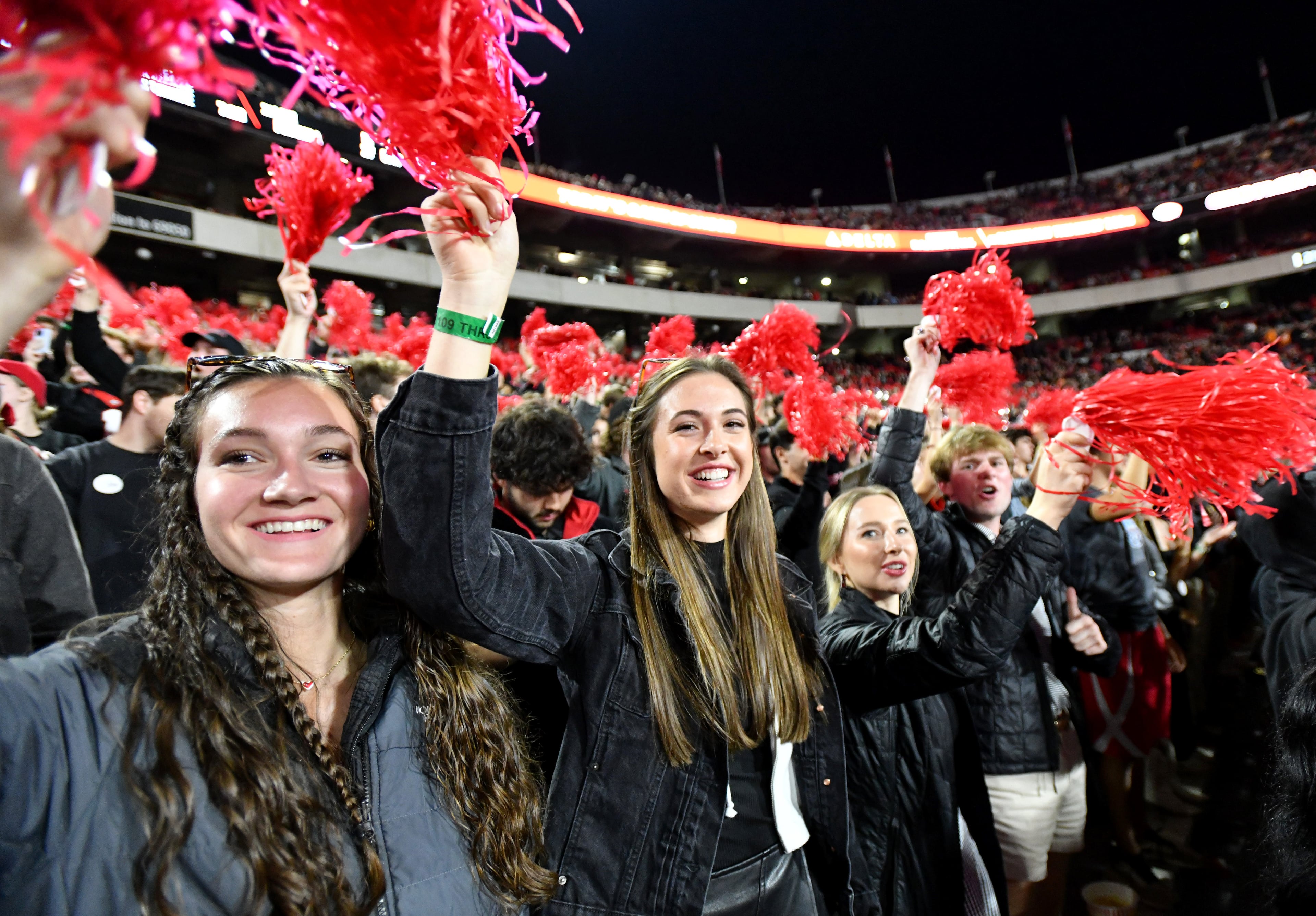Georgia fans cheer before an NCAA football game between Georgia and Tennessee at Sanford Stadium, Saturday, November 16, 2024, in Athens. (Hyosub Shin / AJC)