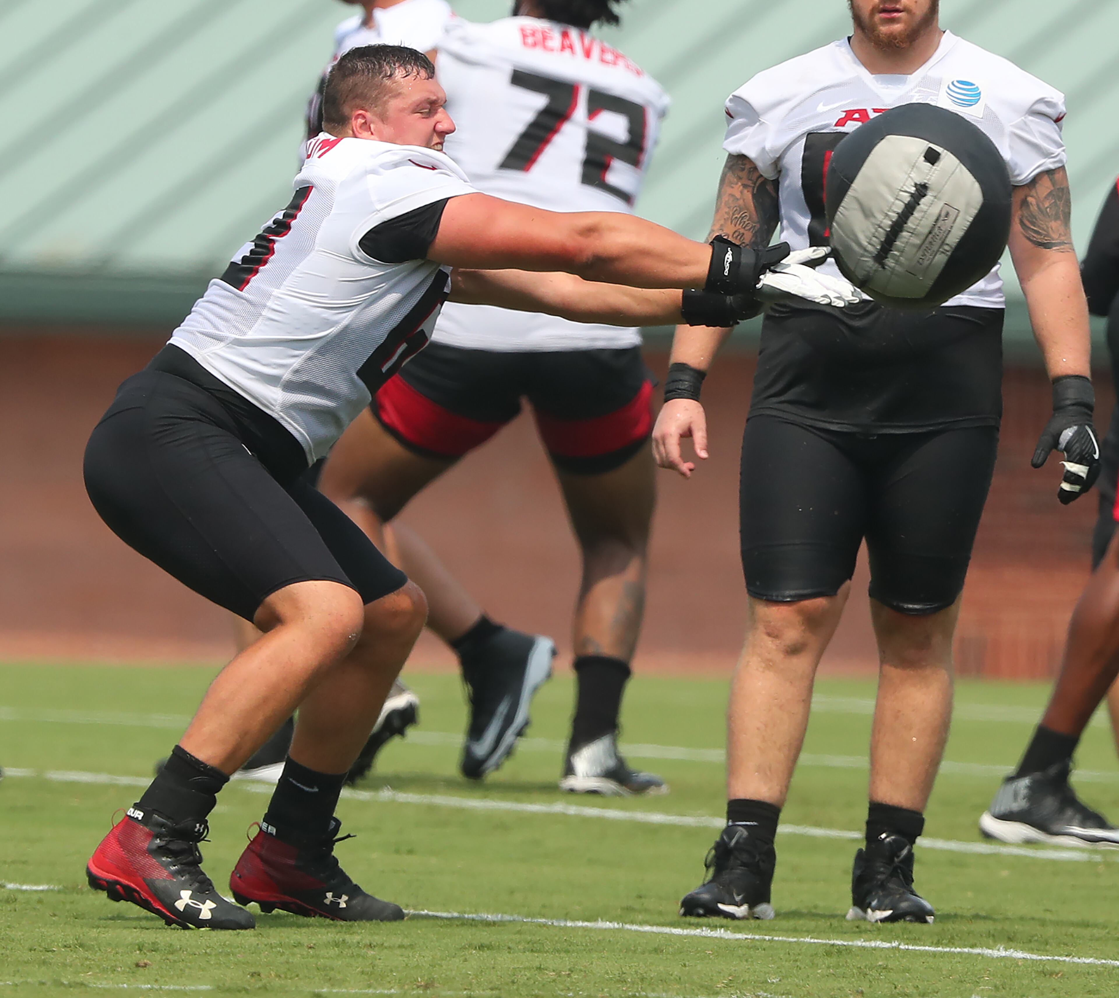 073021 Flowery Branch: Atlanta Falcons guard Chris Lindstrom gets in some extra work with the offensive line running agility drills after the second day of training camp practice at the team training facility on Friday, July 30, 2021, in Flowery Branch. “Curtis Compton / Curtis.Compton@ajc.com”