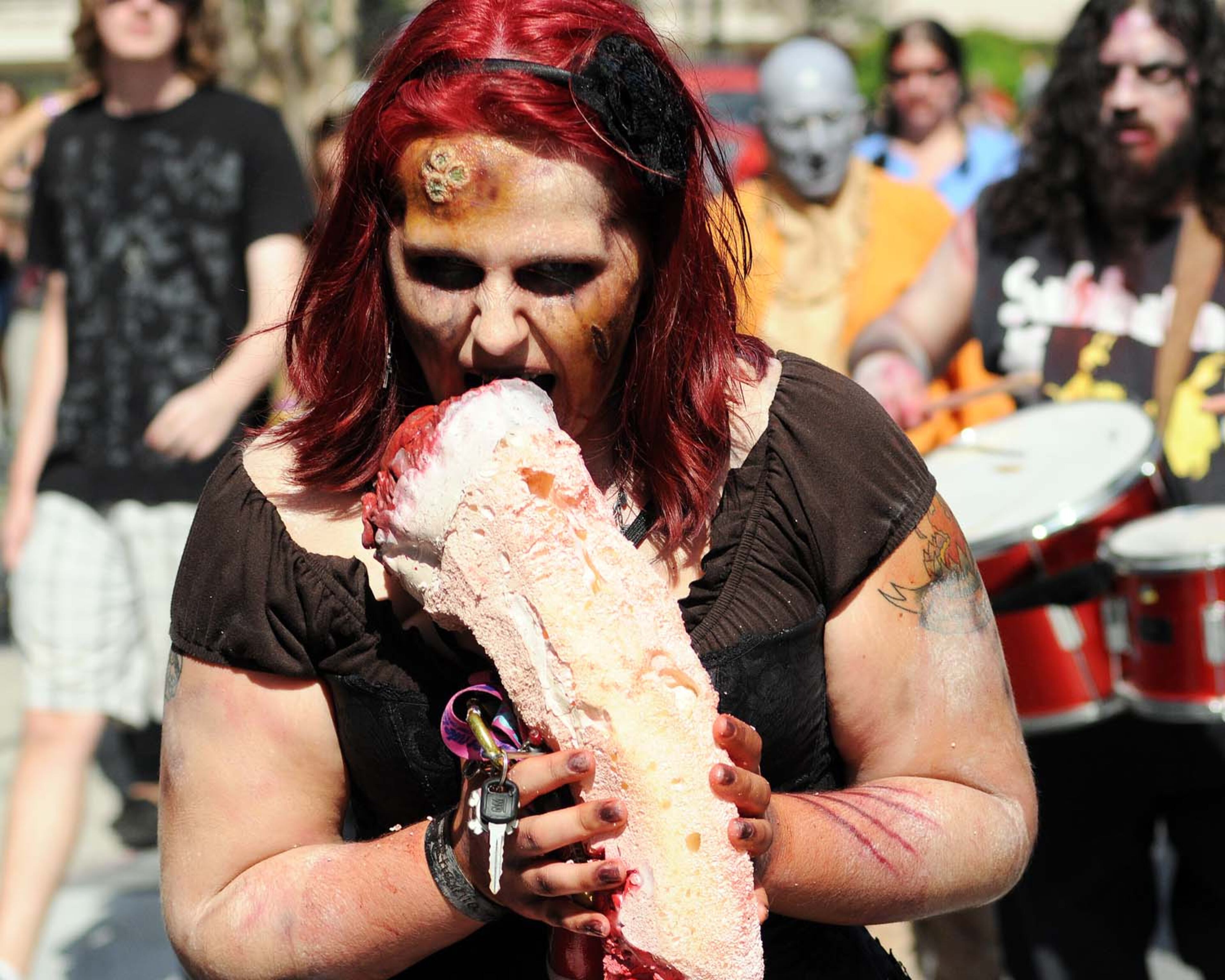A pack of blood-thirsty zombies marched on the Rosen Centre Hotel in Orlando, Florida to kick off Spooky Empire's annual May-Hem horror convention.