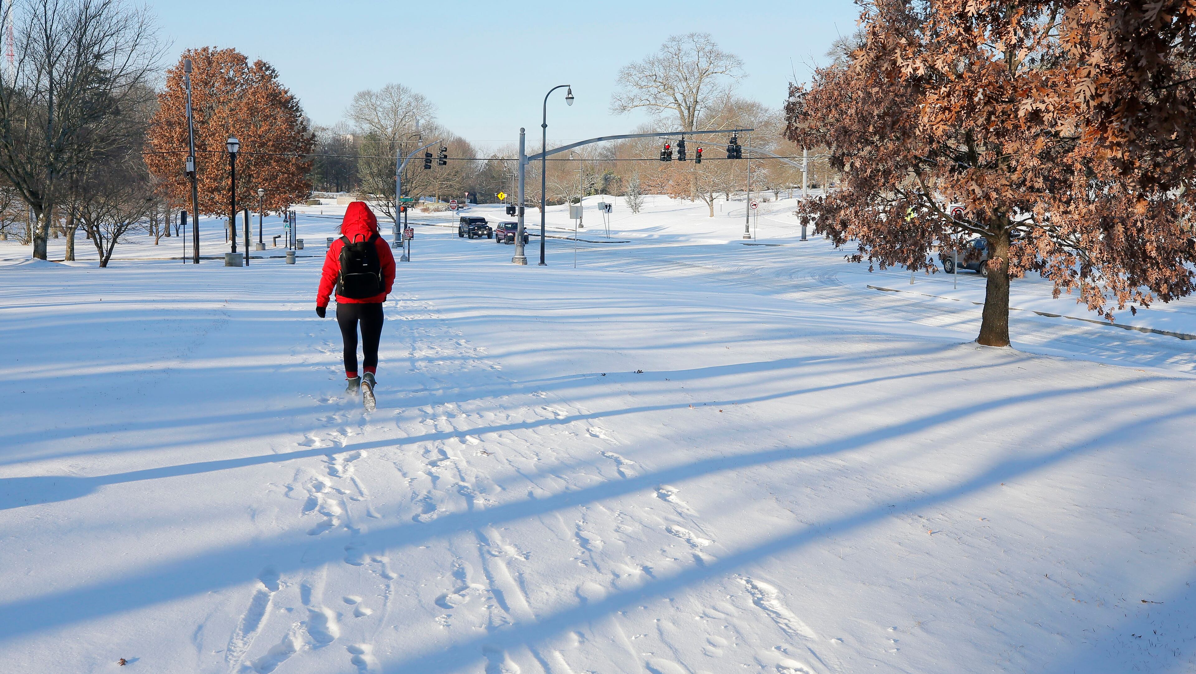1/17/18 - Atlanta - Freedom Parkway trail is covered with a blanket of snow. With temperatures in the teens, overnight snowfall is expected to remain into Thursday. Gov. Deal declared a state of emergency in 83 Georgia counties for Wednesday, Jan. 17. BOB ANDRES /BANDRES@AJC.COM