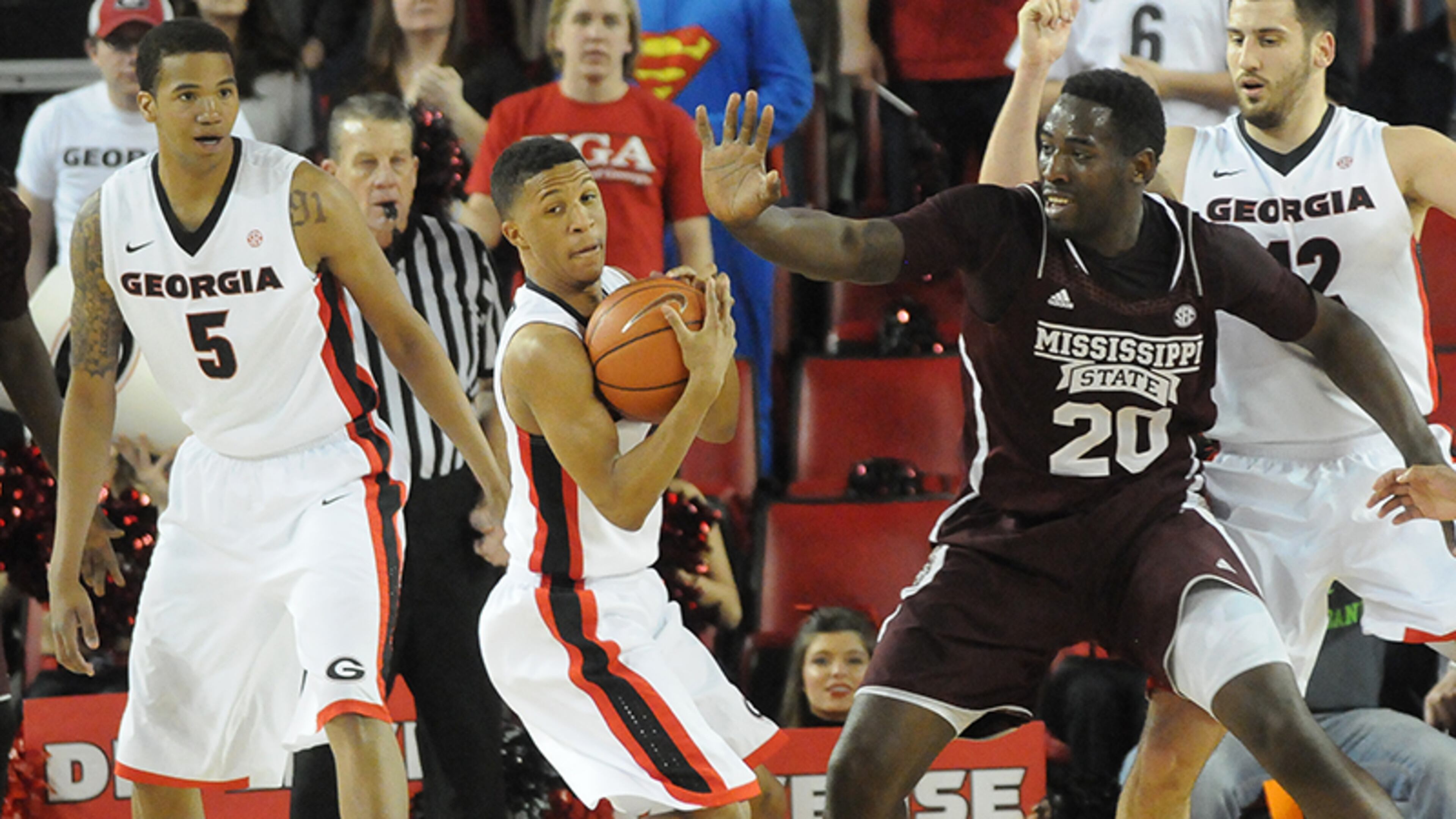 Georgia's Juwan Parker (3) steals the ball from Mississippi State's Gavin Ware as Georgia scored its 11th victory against an SEC opponent for the first time since 2003 on Wednesday, March 5, 2014, in Athens.