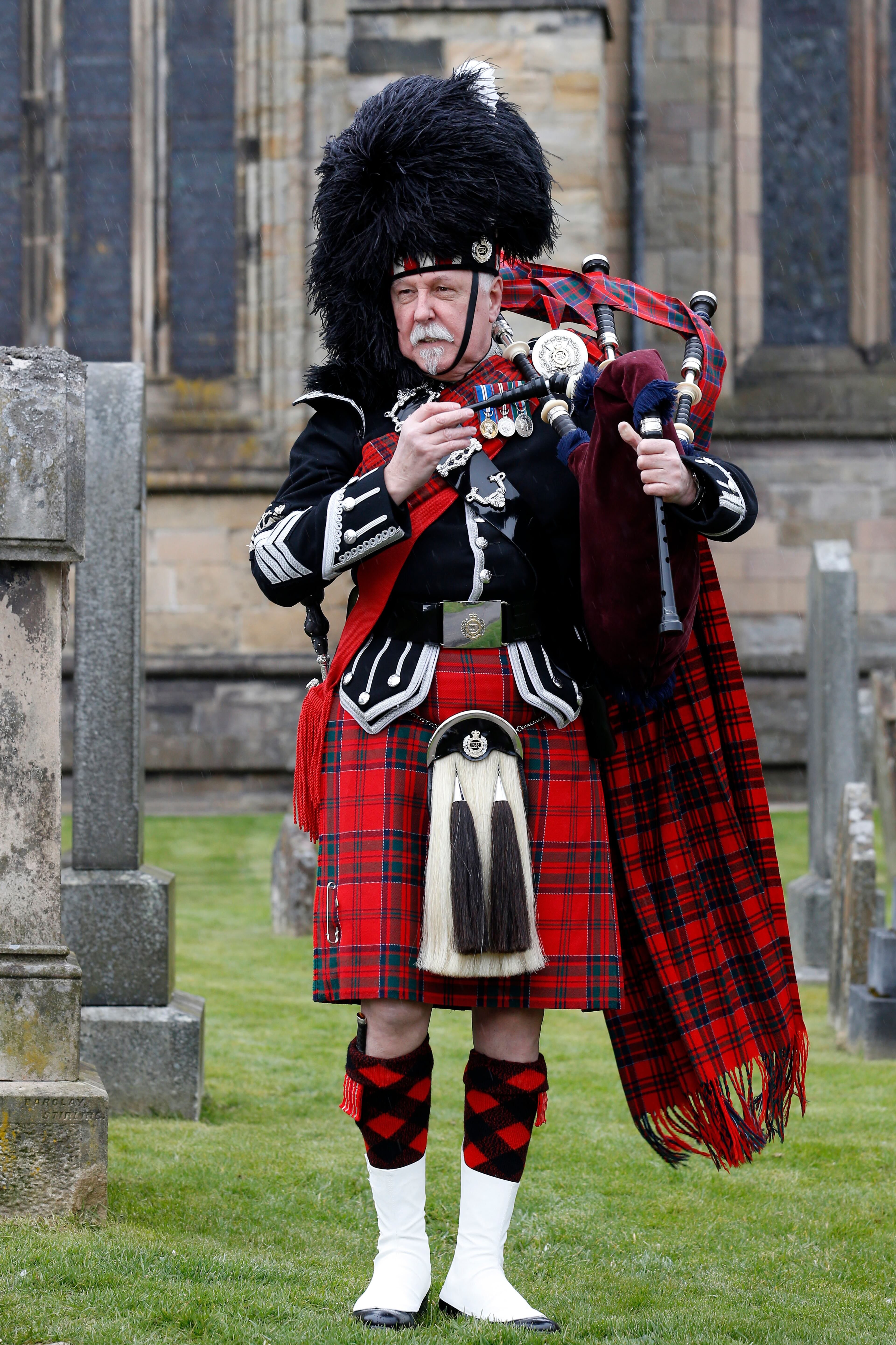 DUNBLANE, UNITED KINGDOM - APRIL 11: A piper seen at the wedding of Andy Murray and Kim Sears on April 11, 2015 in Dunblane, Scotland. (Photo by Alex Huckle/Getty Images)