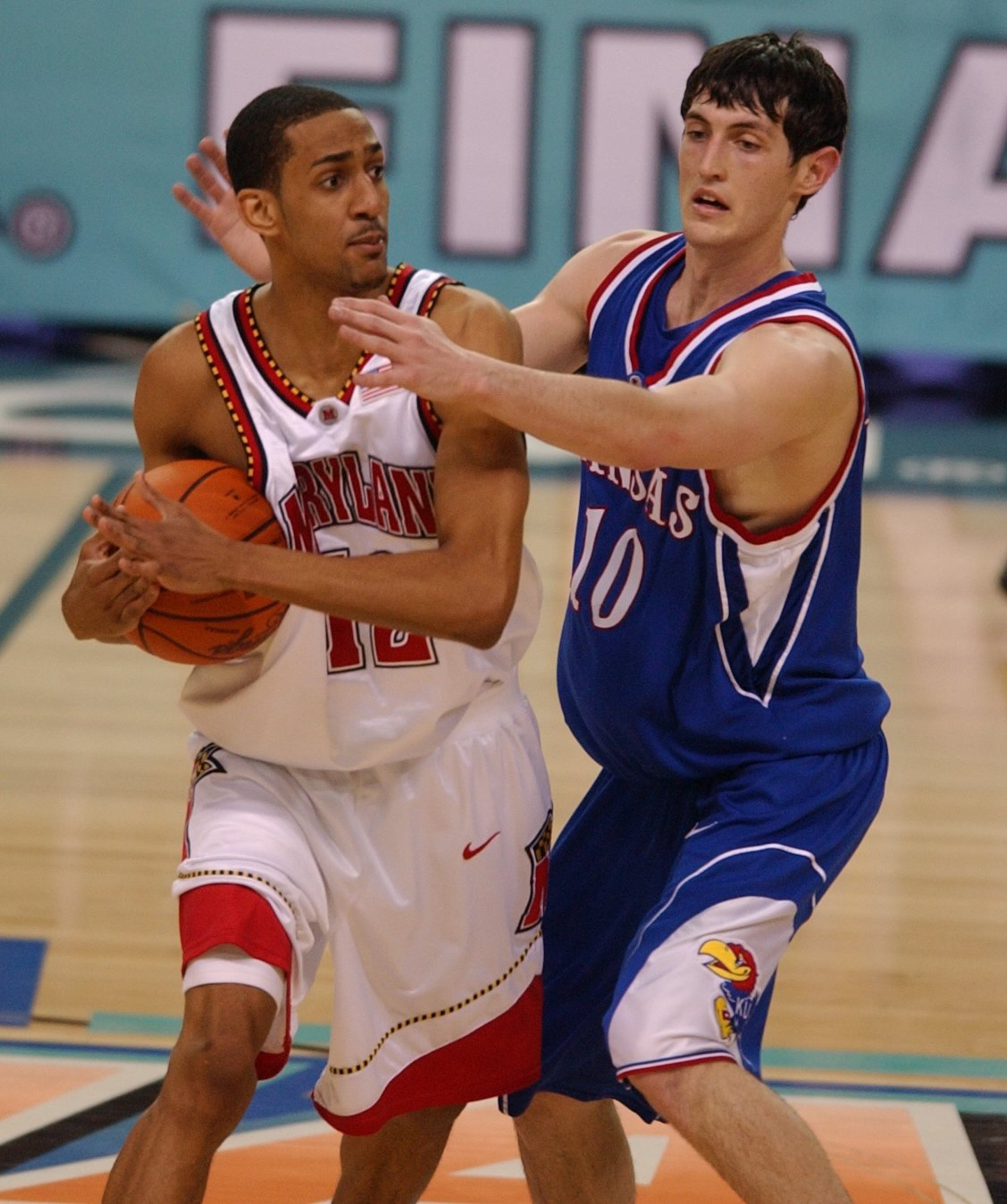 Maryland's Drew Nicholas calls time out under pressure from Kentucky University's Kirk Hinrich in the first half of Game 2 in the NCAA Men's Final Four between Kansas and Maryland on Saturday night, March 30, 2002 at the Georgia Dome.