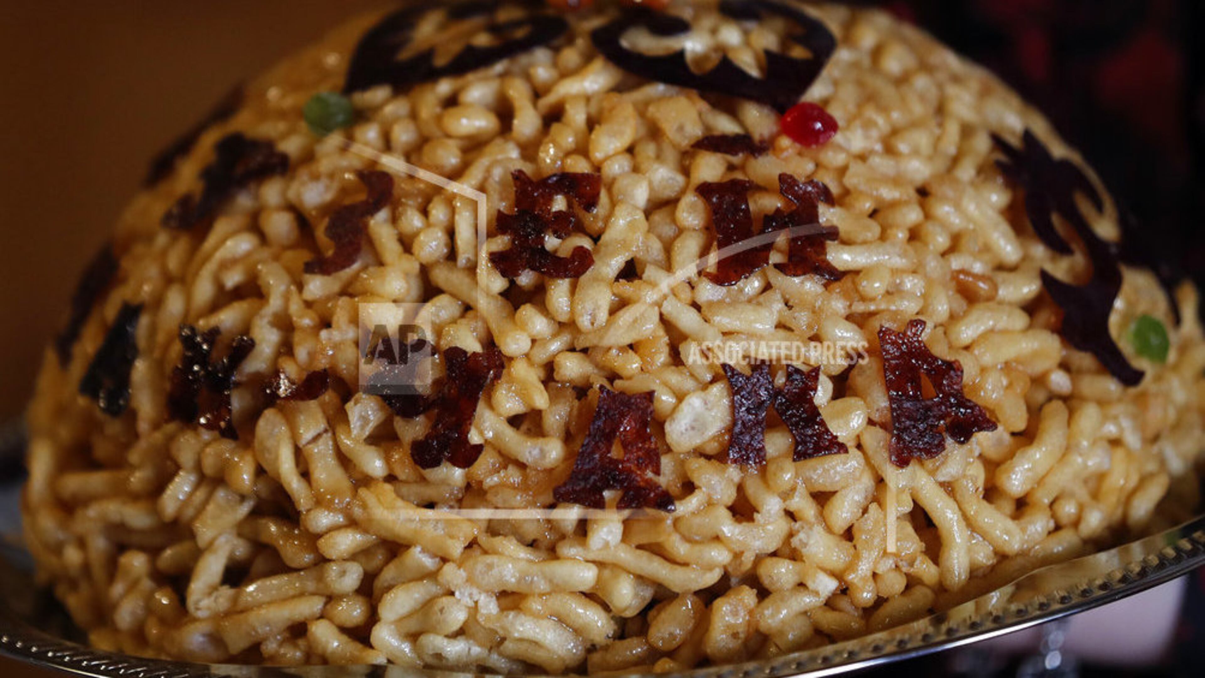 In this picture taken on Thursday, June 21, 2018, a traditional chak-chak is displayed during the 2018 soccer World Cup at the Chak-Chak museum in Kazan, Russia. There is arguably more chak-chak on offer in Kazanâs shops, cafes and restaurants than football fans attending soccer World Cup matches in the Tatarstan capital. The Tatar dessert that is traditionally eaten at weddings has become a symbol of the autonomous region known as the âLand of 1,001 Delights.â (AP Photo/Frank Augstein)