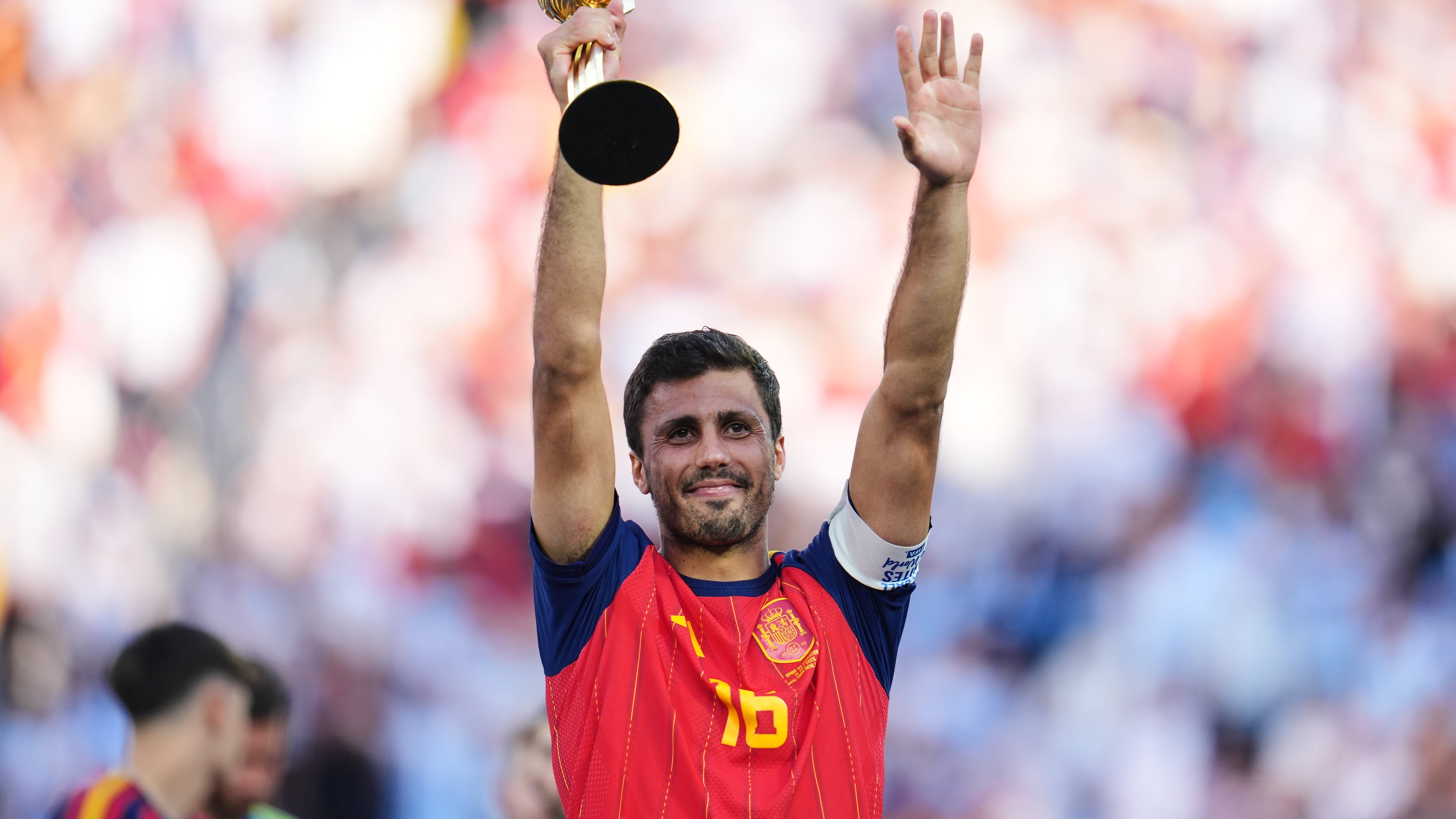 Spain's Rodri celebrates with the tournament's best player award after the World Cup final soccer match between Spain and Argentina in East Rutherford, N.J., near New York, Sunday, July 19, 2026. (AP Photo/Abbie Parr)