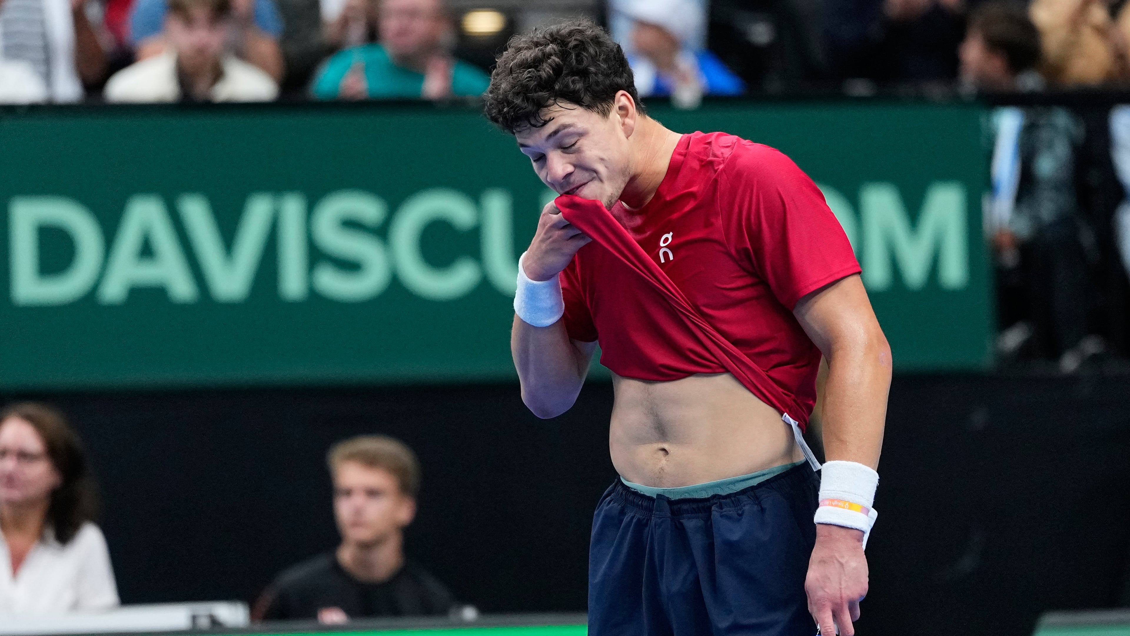United States' Ben Shelton wipes his face after a point against Czechia's Jakub Mensik during the Davis Cup second round qualifier match between the Czech Republic and the United States, in Prague, Saturday, Sept. 19, 2026. (AP Photo/Petr David Josek)