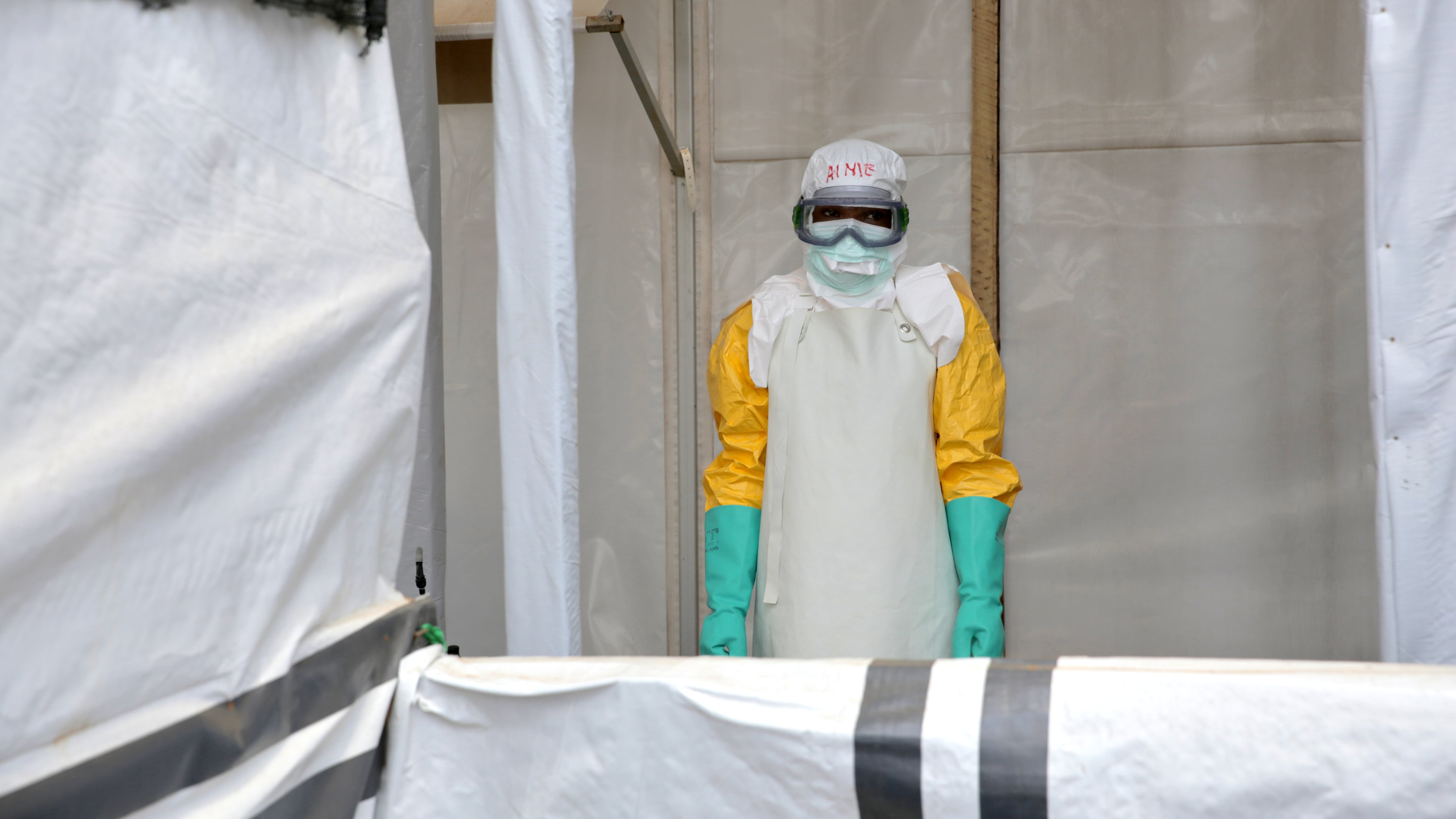 A health worker pauses after disinfecting a treatment center for Ebola patients, in Beni, North Kivu province, eastern Congo, Monday, Aug. 31, 2026. (AP Photo/Sebastien Kitsa Musayi)