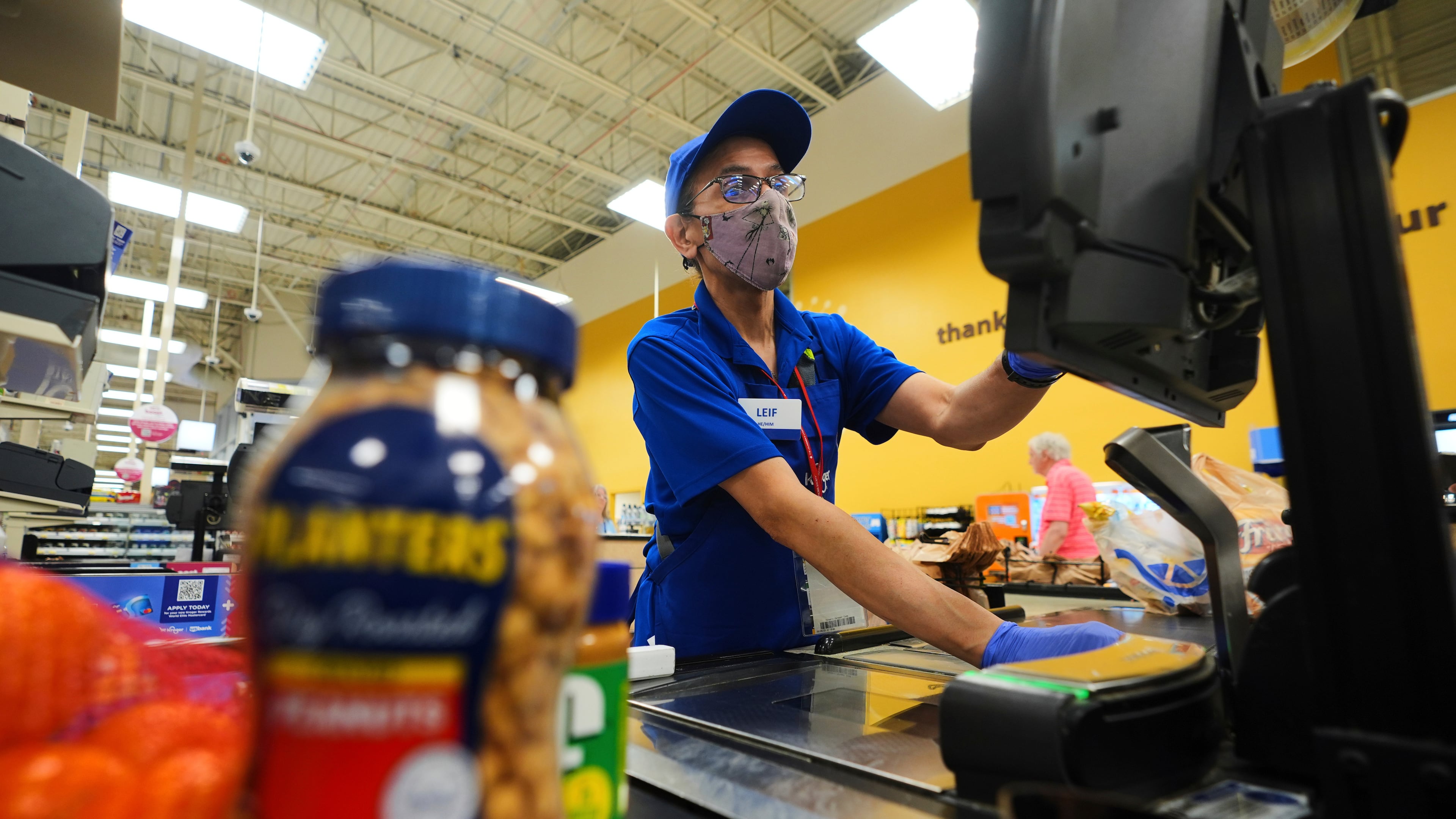 FILE -A cashier rings up groceries in Dallas, Aug. 28, 2025. (AP Photo/LM Otero, File)