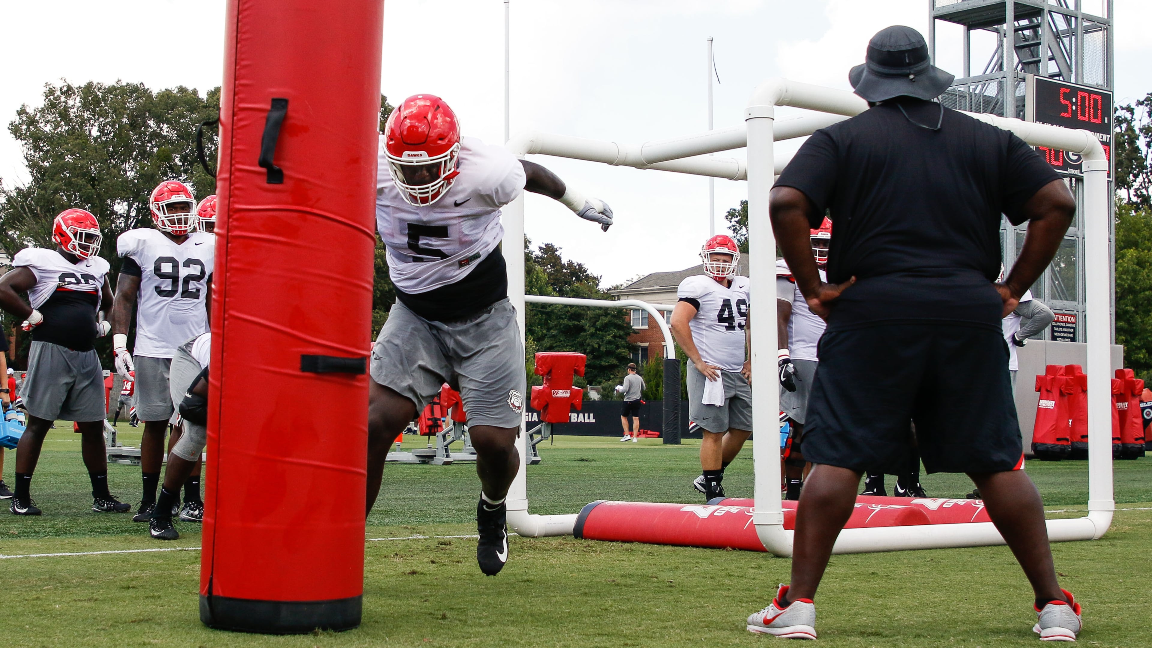 Georgia defensive lineman Julian Rochester (5) completes a drill at practice Monday, Aug. 6, 2018, at the Woodruff Practice Fields on the Georgia campus in Athens.