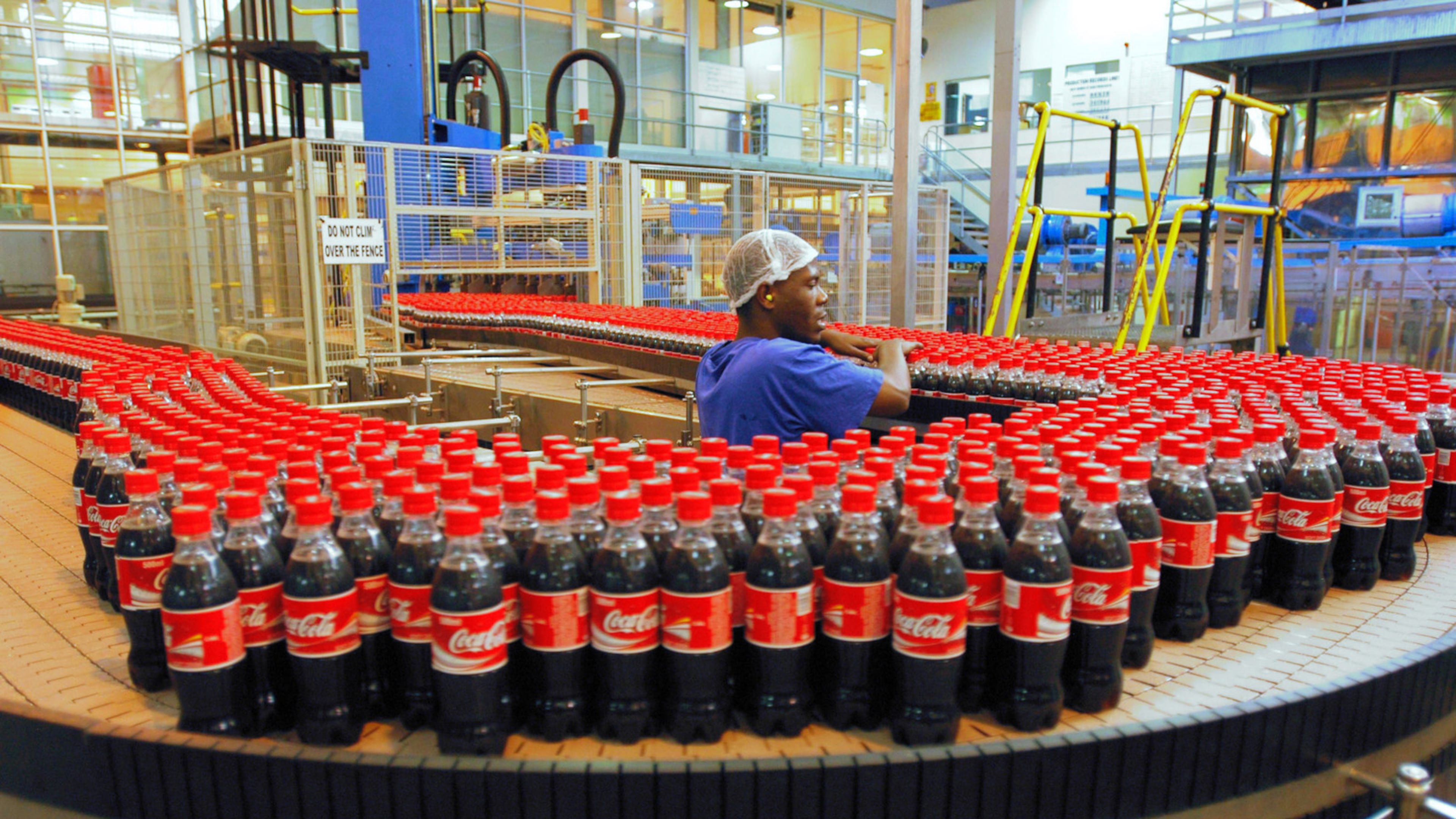 A Birmingham firm has taken over Coca-Cola’s bottling operations in metro Atlanta and other Georgia territories as part of Coke’s efforts to “refranchise” its global bottling operations. File photo of a South African bottling plant. Photographer: Henner Frankenfeld/Bloomberg News.