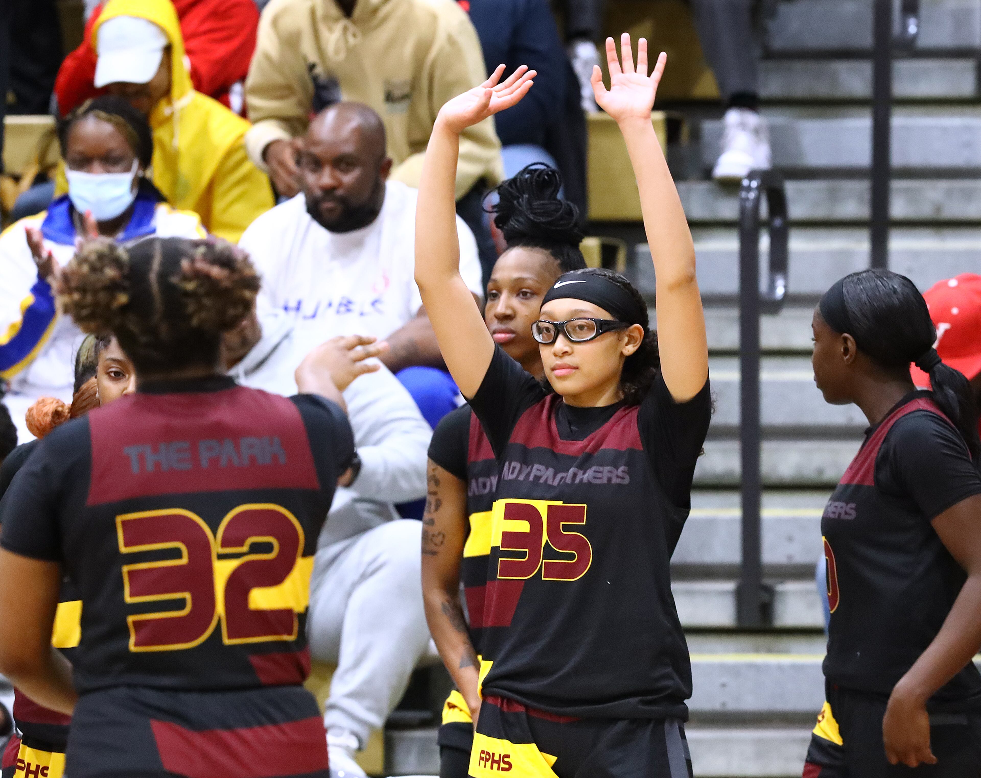 Forest Park guard Yasmine Allen waves after advancing with a 52-40 victory over Loganville in the high school basketball tournament game on Wednesday, March 2, 2022, in Loganville. “Curtis Compton / Curtis.Compton@ajc.com”`