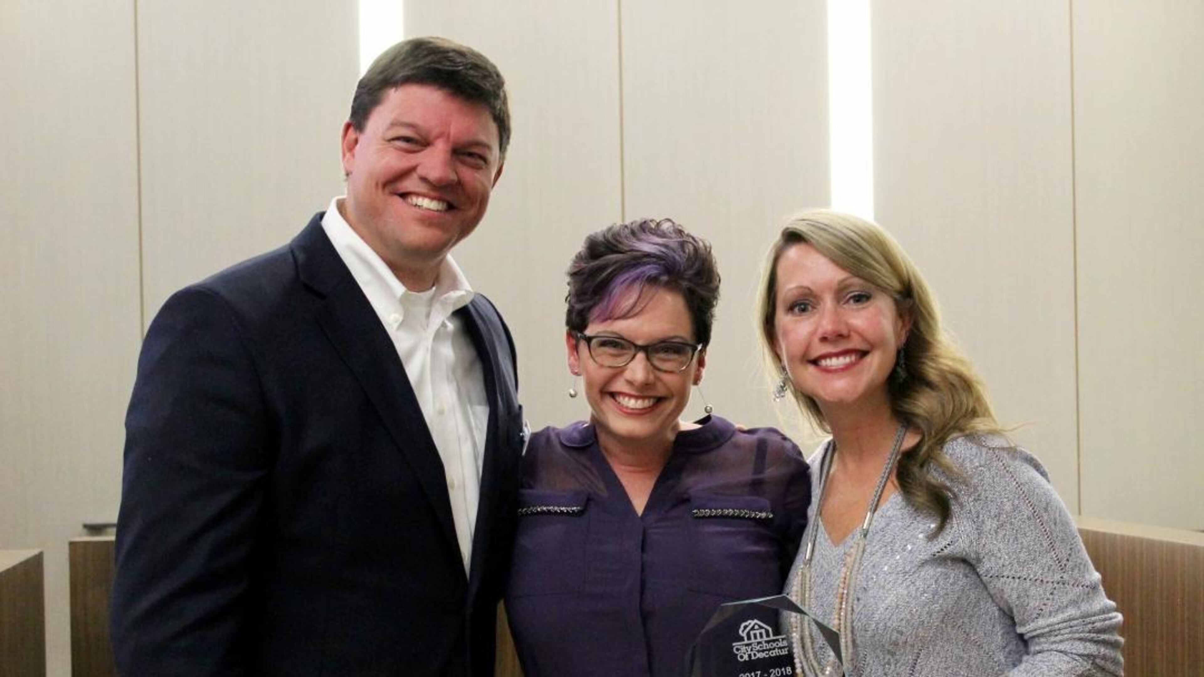 City Schools Decatur’s Teacher of the Year Jennifer Querubin is shown here with Superintendent David Dude (l) and Board Chair Annie Caiola (r). Courtesy City Schools of Decatur.
