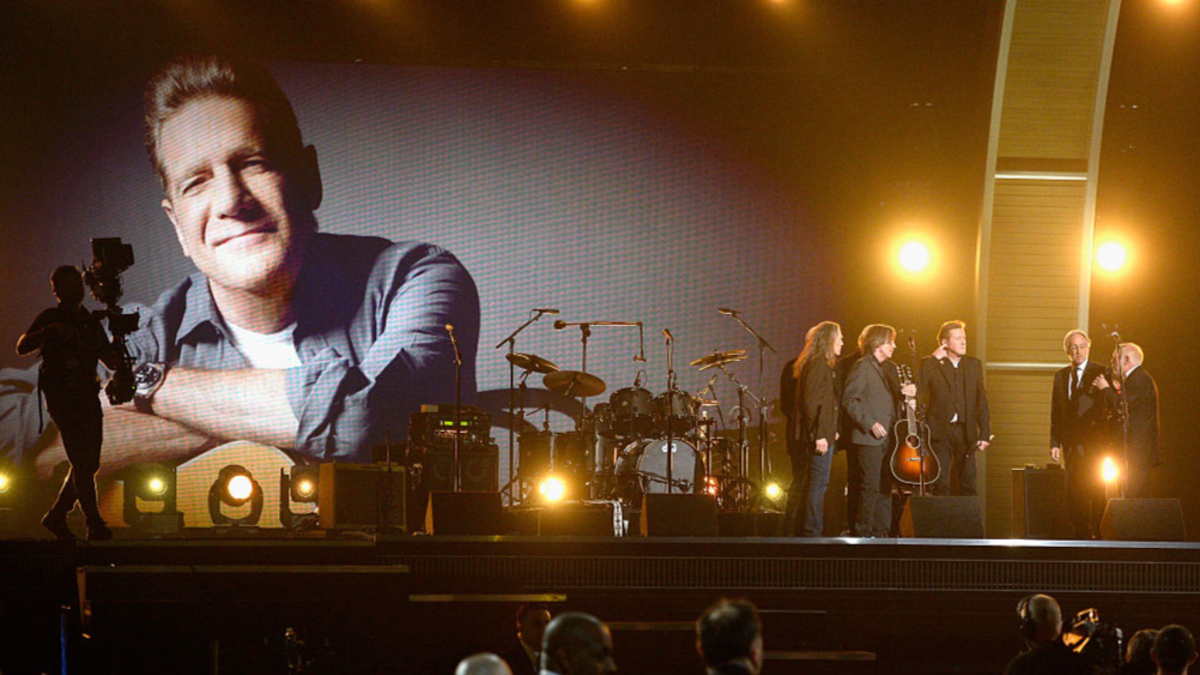 LOS ANGELES, CA - FEBRUARY 15: Musician Don Henley (3rd from R) of the Eagles accepts the band's 1977 Record of the Year award for "Hotel California" onstage from National Academy of Recording Arts and Sciences President Neil Portnow (2nd from R) and broadcast producer Ken Ehrlich (R) during The 58th GRAMMY Awards at Staples Center on February 15, 2016 in Los Angeles, California. (Photo by Kevork Djansezian/Getty Images)