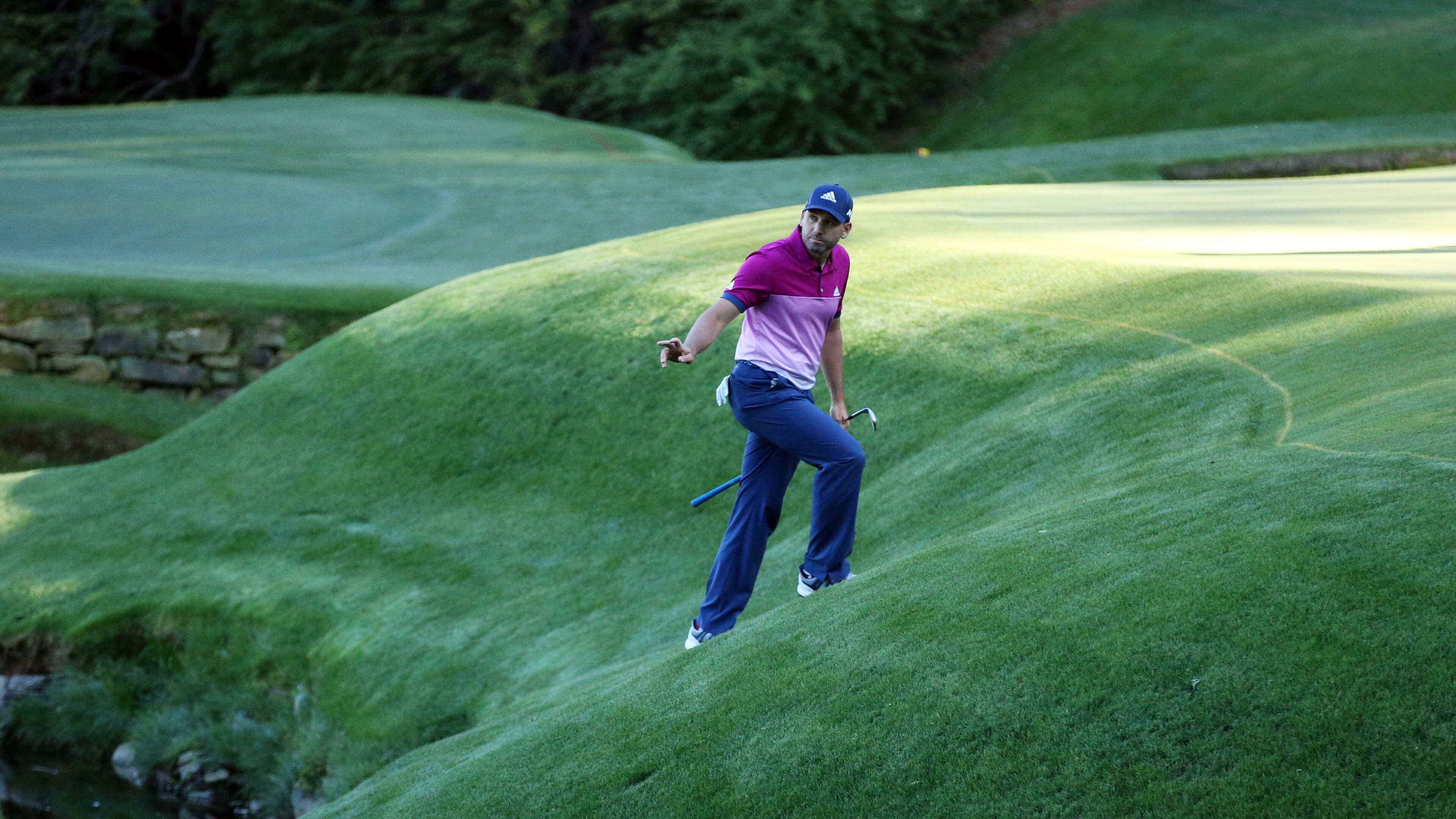 Sergio Garcia's march to his first major title at this year's Masters didn't come without some adventure on the bank fronting the green at No. 13. (Curtis Compton/ AJC)