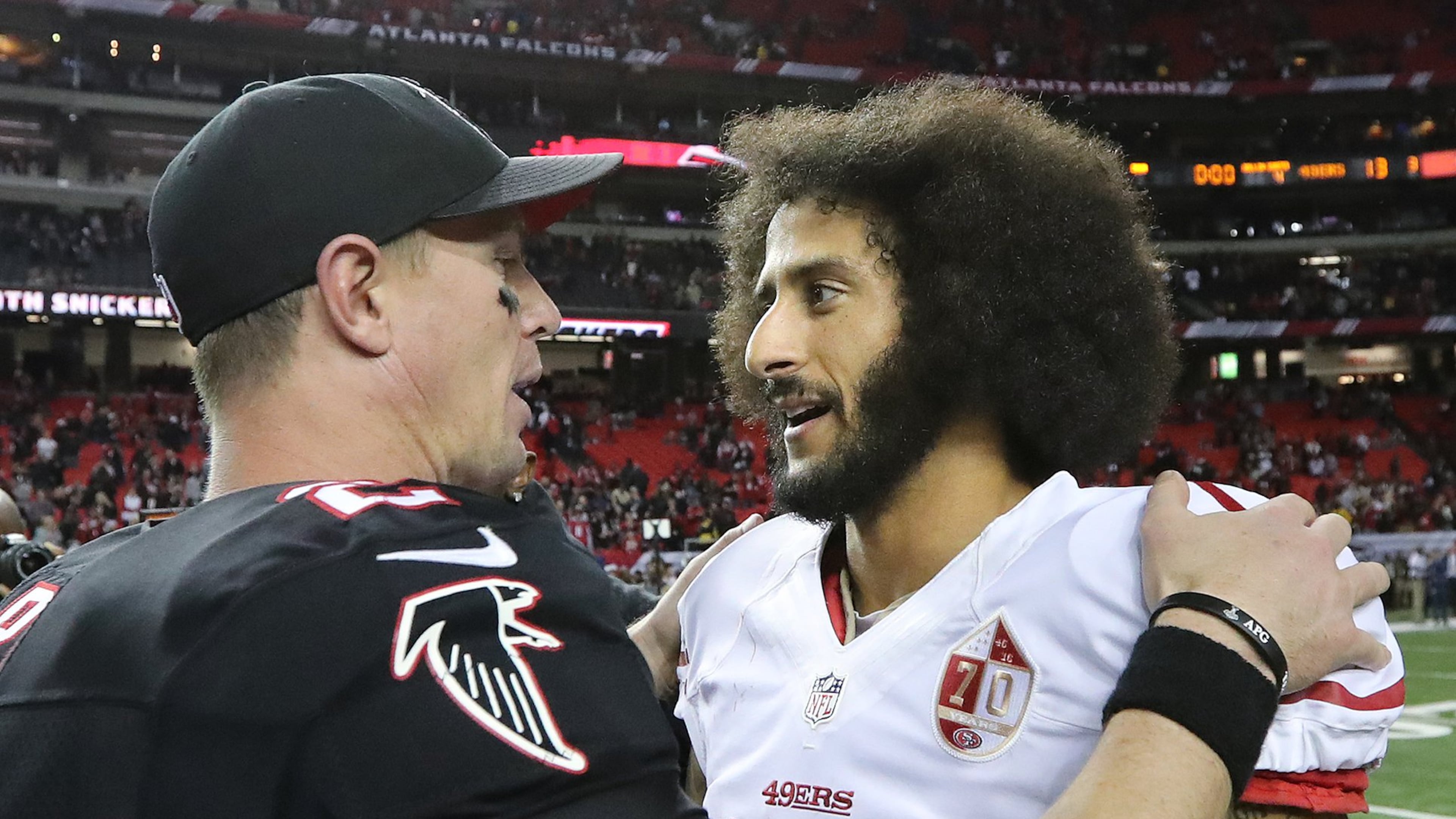 December 18, 2016, ATLANTA: Falcons quarterback Matt Ryan gives 49ers quarterback Colin Kaepernick a hug after a 41-13 victory over the 49ers during an NFL football game on Sunday, Dec. 18, 2016, in Atlanta. Curtis Compton/ccompton@ajc.com