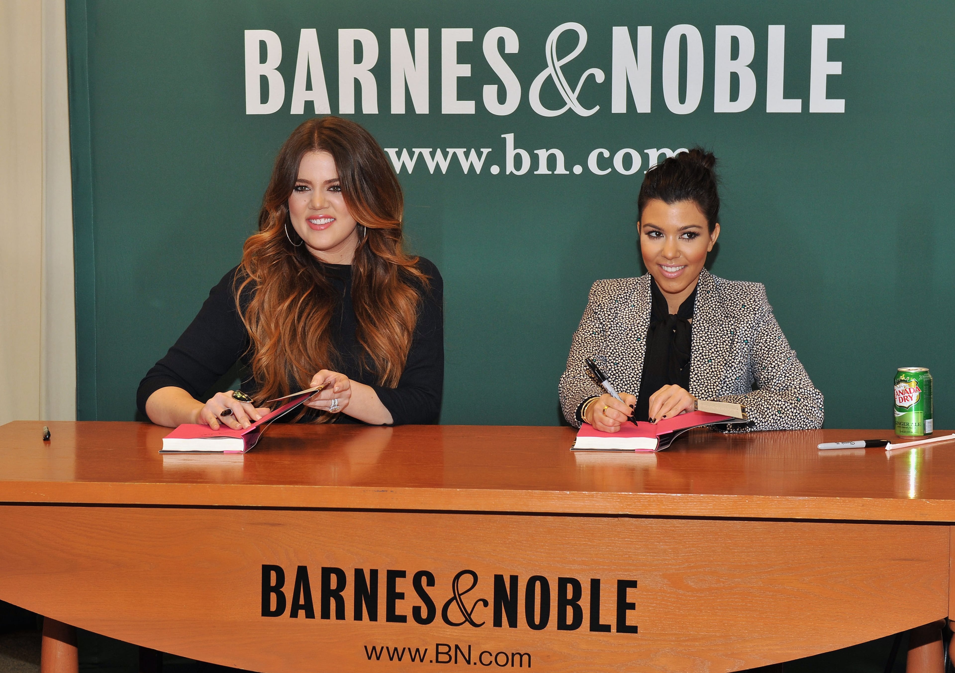 Khloe Kardashian and Kourtney Kardashian promote "Dollhouse" at the Barnes & Noble, 5th Avenue on November 16, 2011 in New York City. (Photo by Slaven Vlasic/Getty Images)