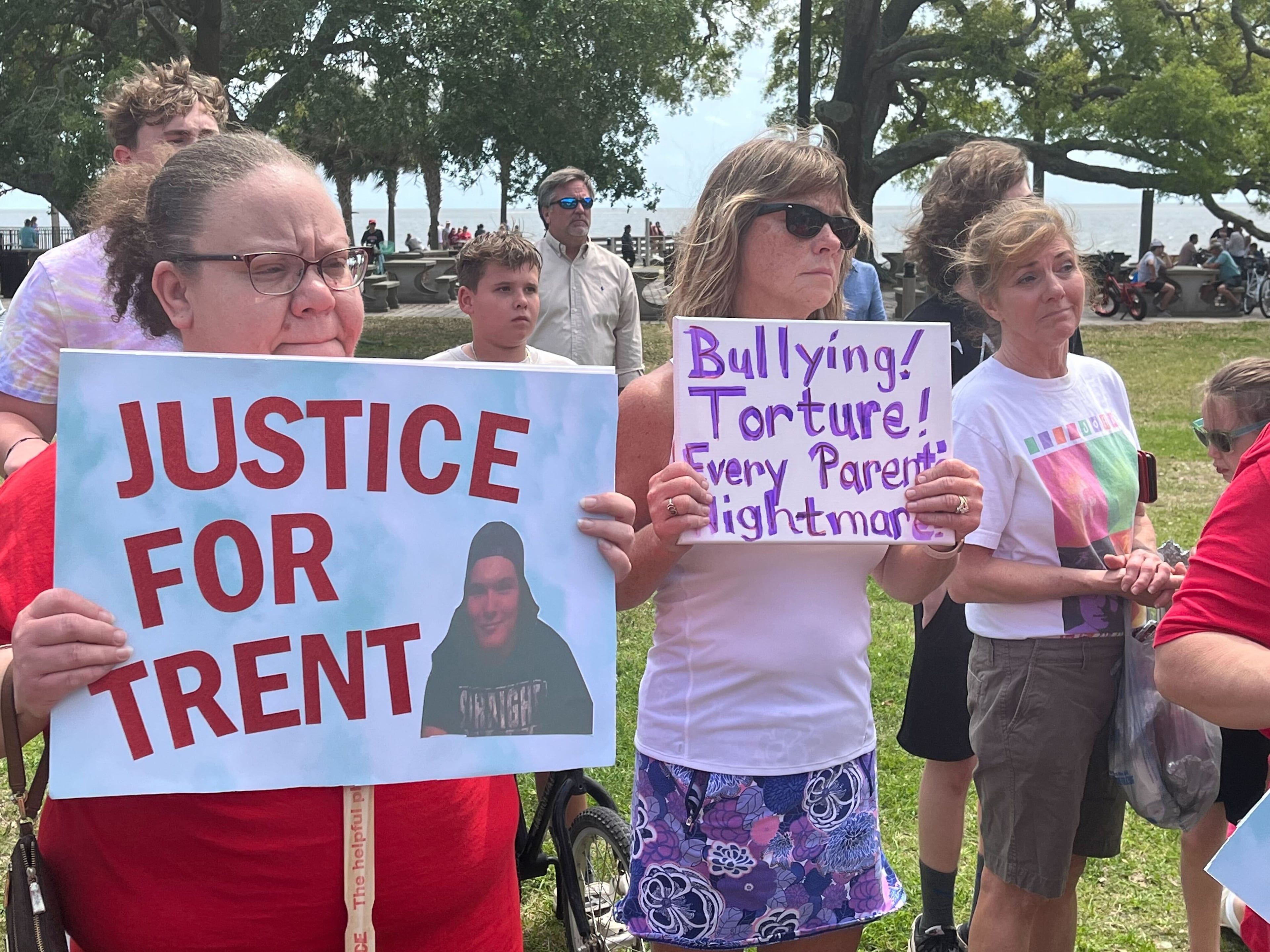 Signs at the rally included "Justice for Trent" and "Bullying! Torture! Every Parent's Nightmare."