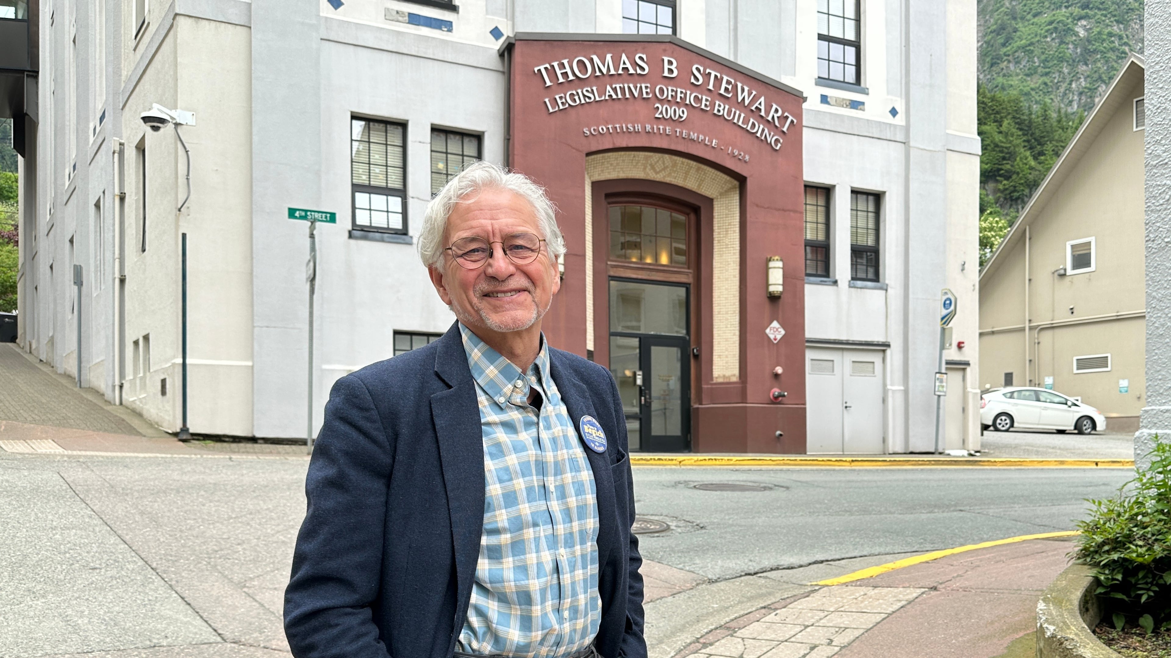 FILE - DDemocratic gubernatorial candidate Tom Begich poses for a photo in downtown Juneau, Alaska, June 17, 2026. (AP Photo/Becky Bohrer, File)
