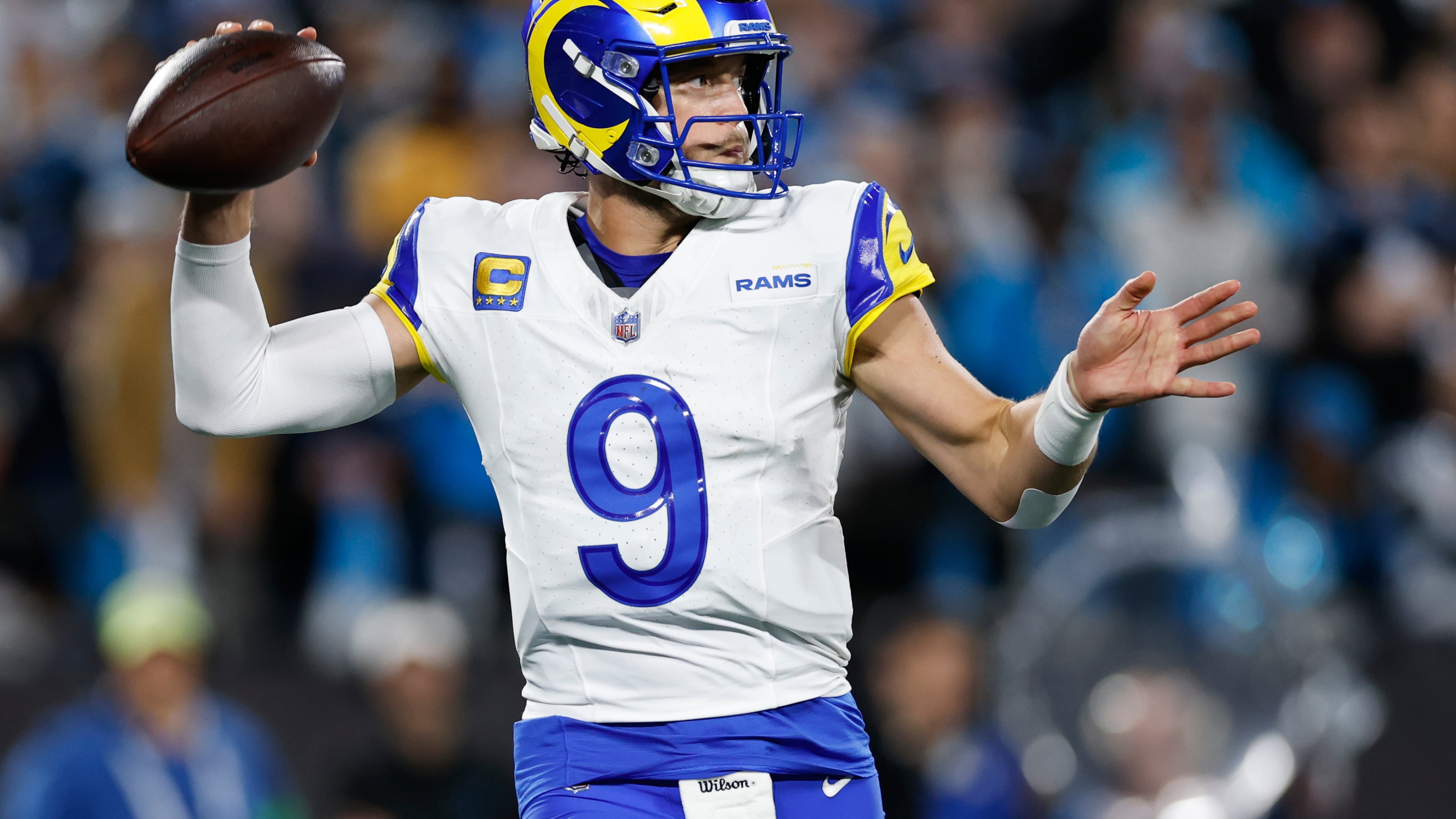 Los Angeles Rams quarterback Matthew Stafford (9) throws a pass during the second half of an NFL wild-card playoff football game against the Carolina Panthers, Saturday, Jan. 10, 2026, in Charlotte, N.C. (AP Photo/Rusty Jones)
