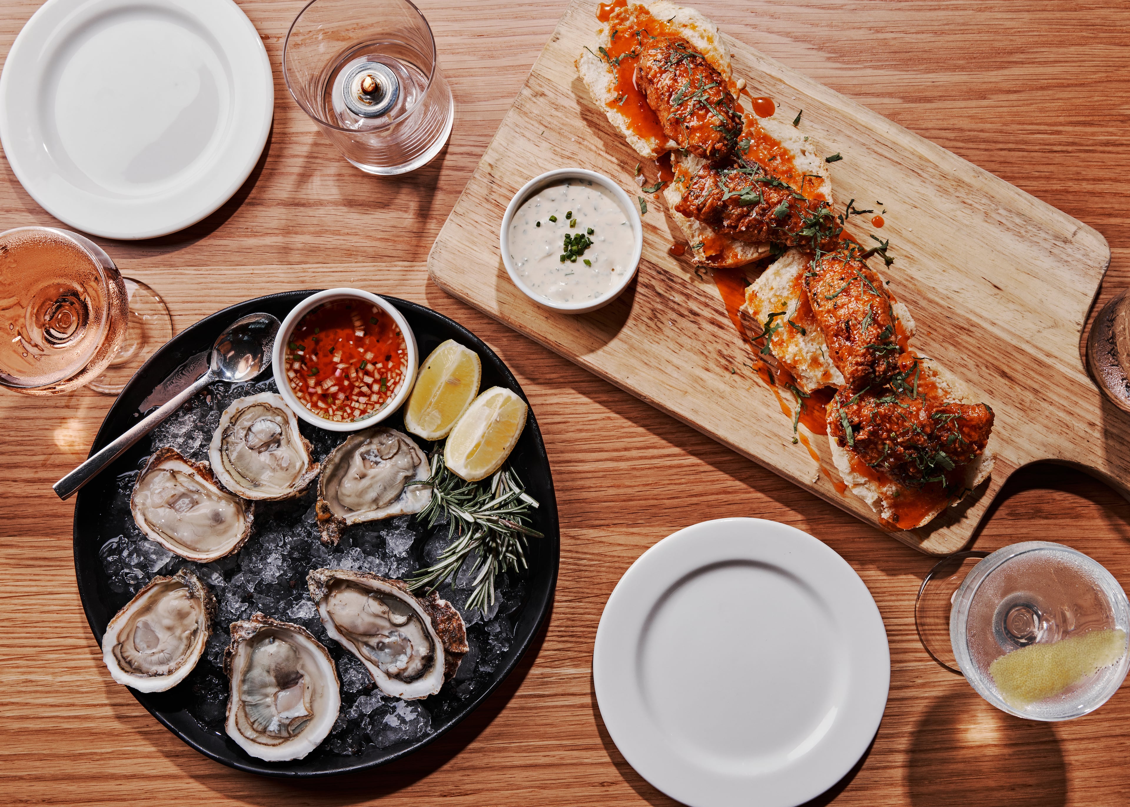 Marcus’ menu offers oysters on the half shell, steaks, barbecue and signature items like brown sugar wings, fried chicken and cornbread waffles, and Old Bay crab cakes. (Courtesy of Andrew Thomas Lee)