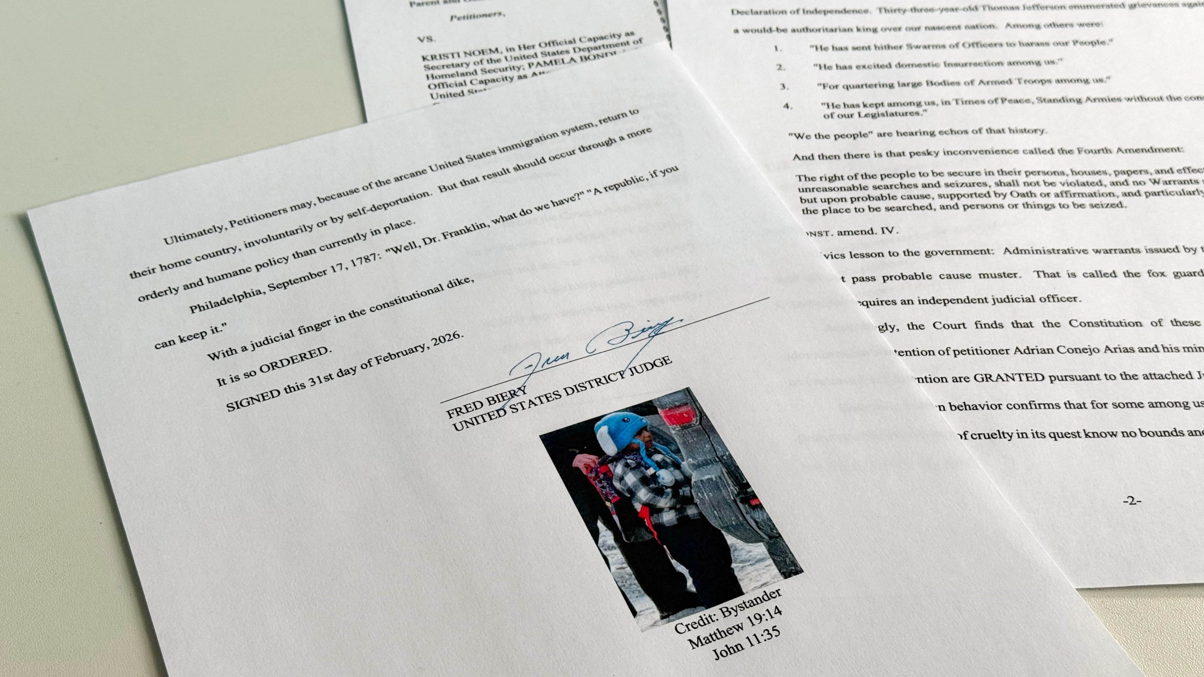 An order to release 5-year-old Liam Conejo Ramos and his father from detention, which included a picture of the boy and Bible verse references under the signature of U.S. District Judge Fred Biery, is photographed Saturday, Jan. 31, 2026. (AP Photo/Sydney Schaefer)