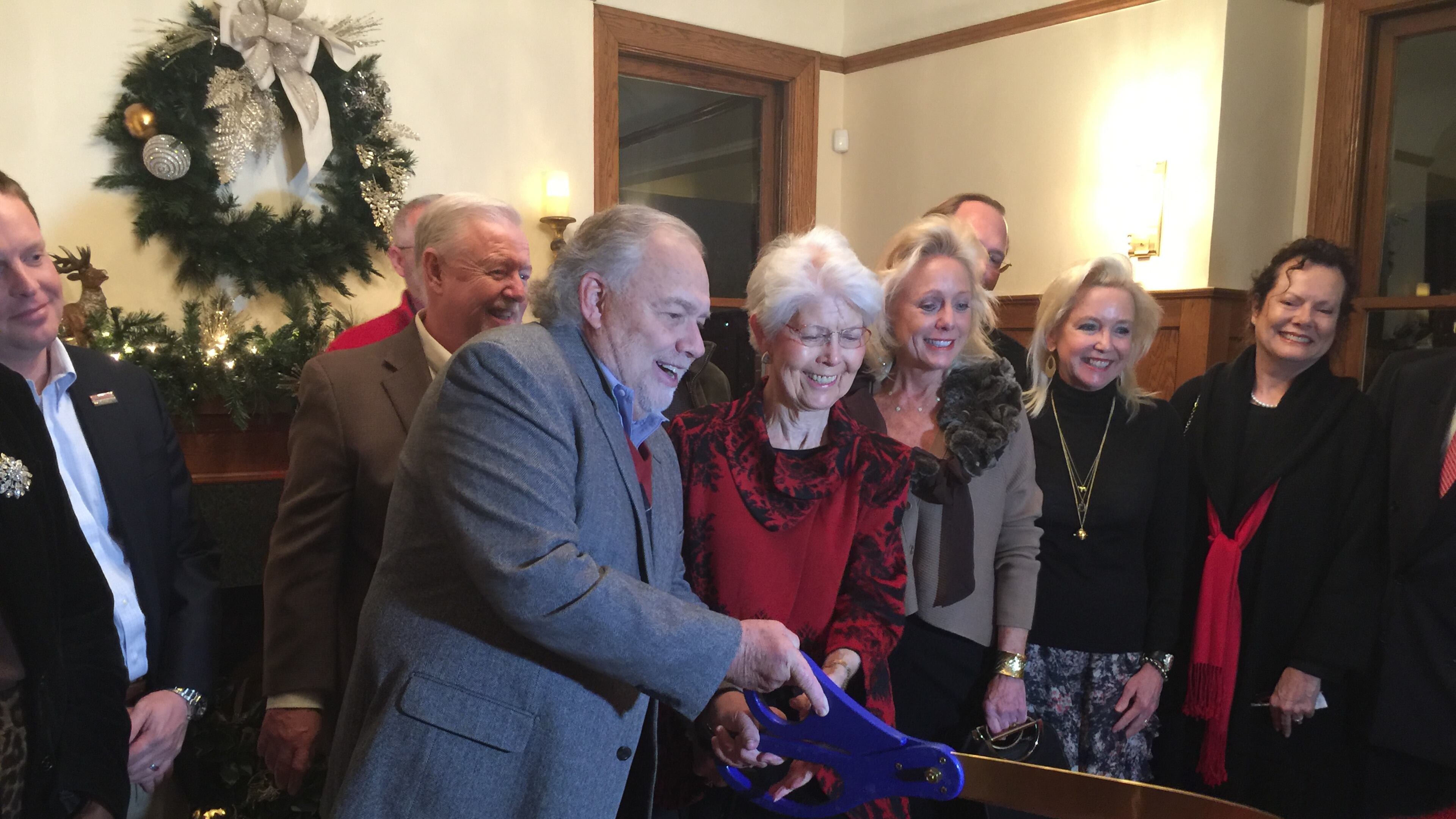 Smyrna Mayor Max Bacon cut the ribbon at the Dec. 11 opening of the city’s Reed House, 3080 Atlanta Road, for use as a special event facility. Courtesy of Smyrna