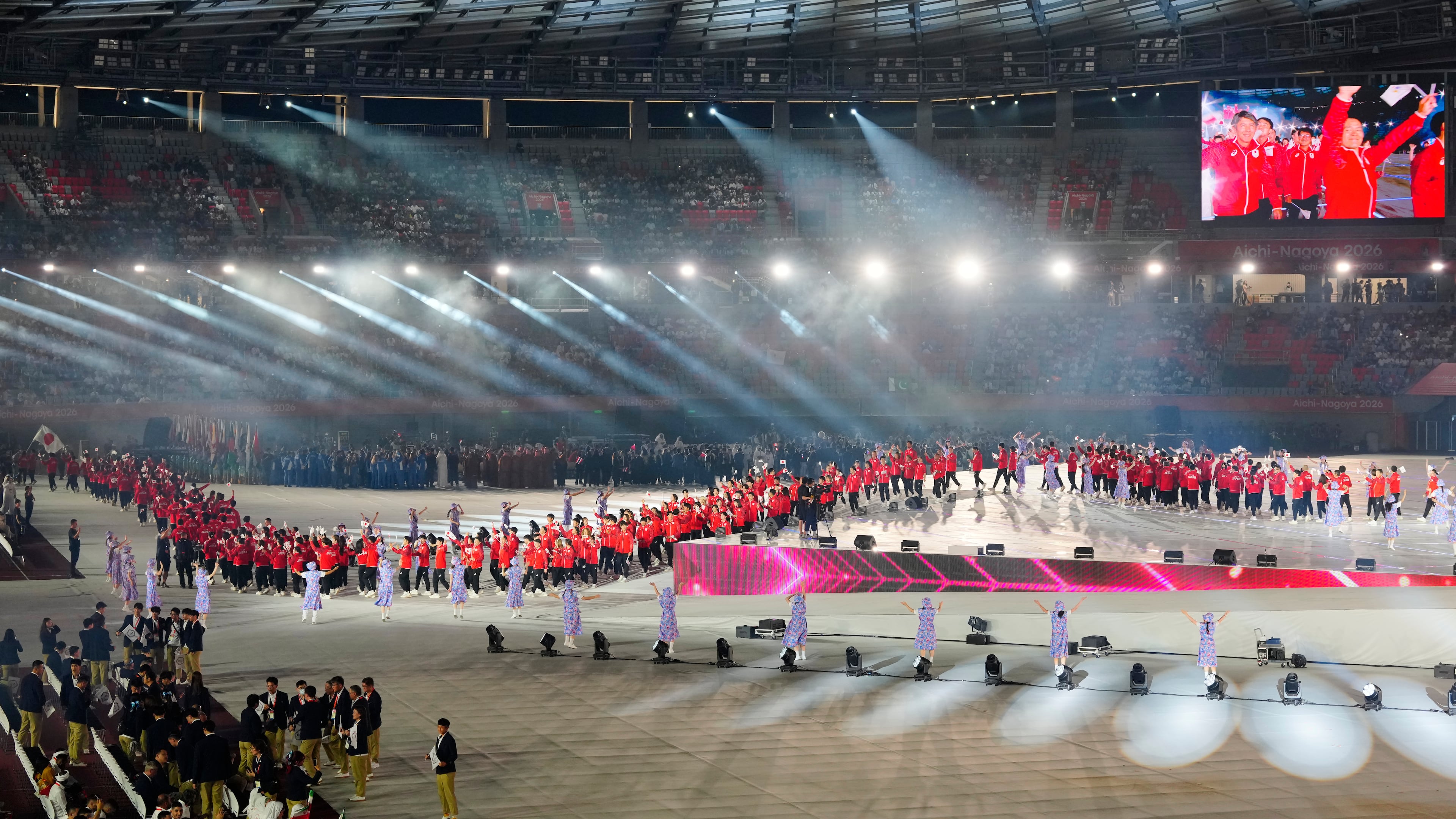 Japanese athletes march into the stadium during the opening ceremony for the Asian Games in Nagoya, Japan, Saturday, Sept. 19, 2026. (AP Photo/Eugene Hoshiko)