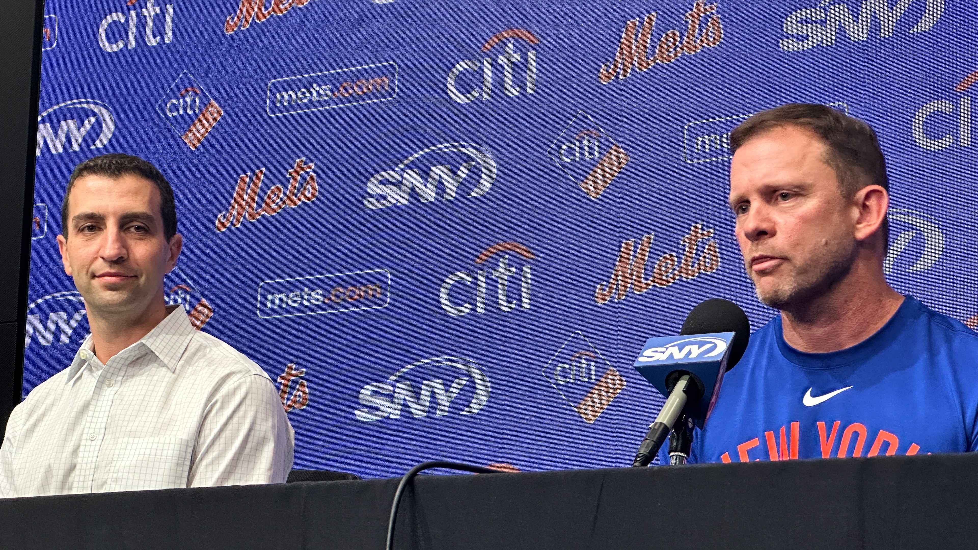 Andy Green, right, responds to question during a news conference where he was introduced as the New York Mets new manager as President of Baseball Operations David Stearns, left, looks on before a baseball game against the Texas Rangers Tuesday, Sept. 22, 2026, in Arlington, Texas. (AP Photo/Stephen Hawkins)