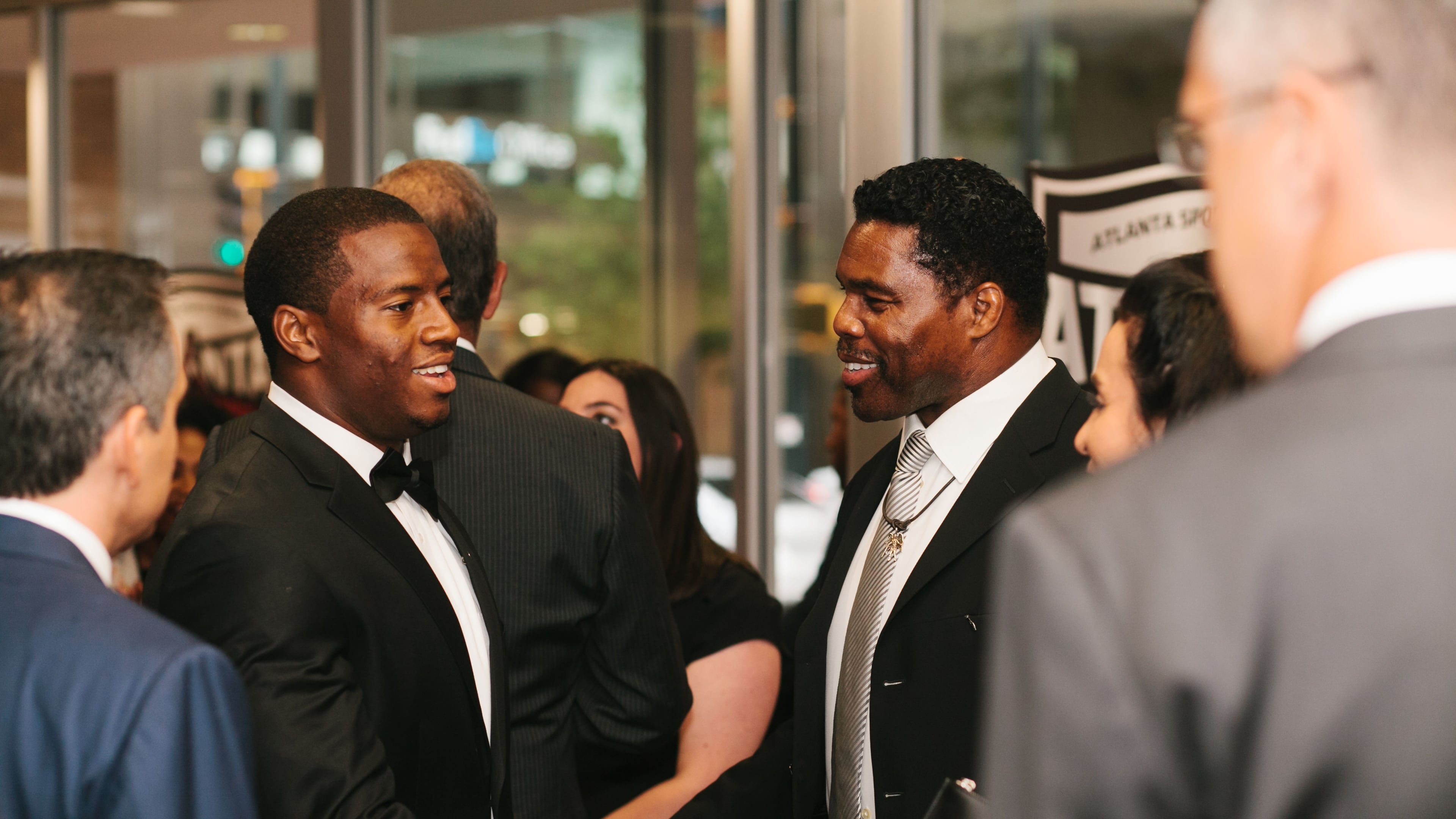 Two UGA greats: Georgia running back Nick Chubb (left) chats with Heisman Trophy winner Herschel Walker at the Atlanta Sports Awards. (Photo courtesy of the Atlanta Sports Awards)